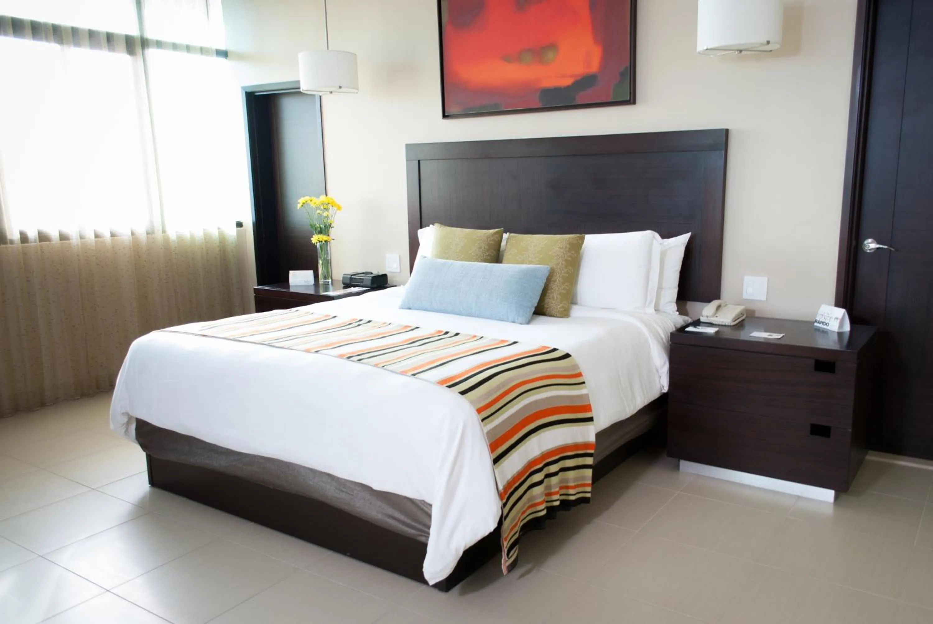 Bed in Summit Rainforest Golf Resort & All Inclusive