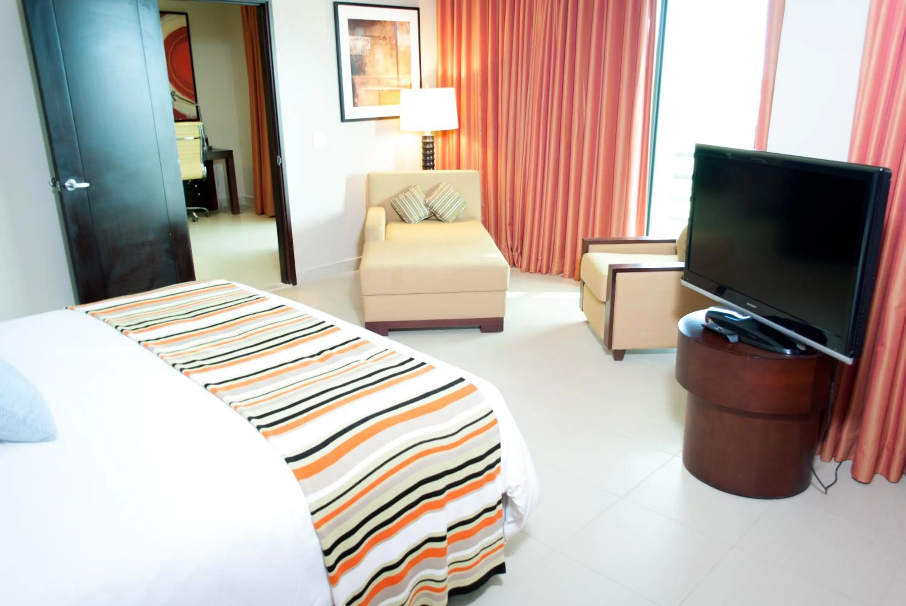 TV and multimedia, Bed in Summit Rainforest Golf Resort & All Inclusive