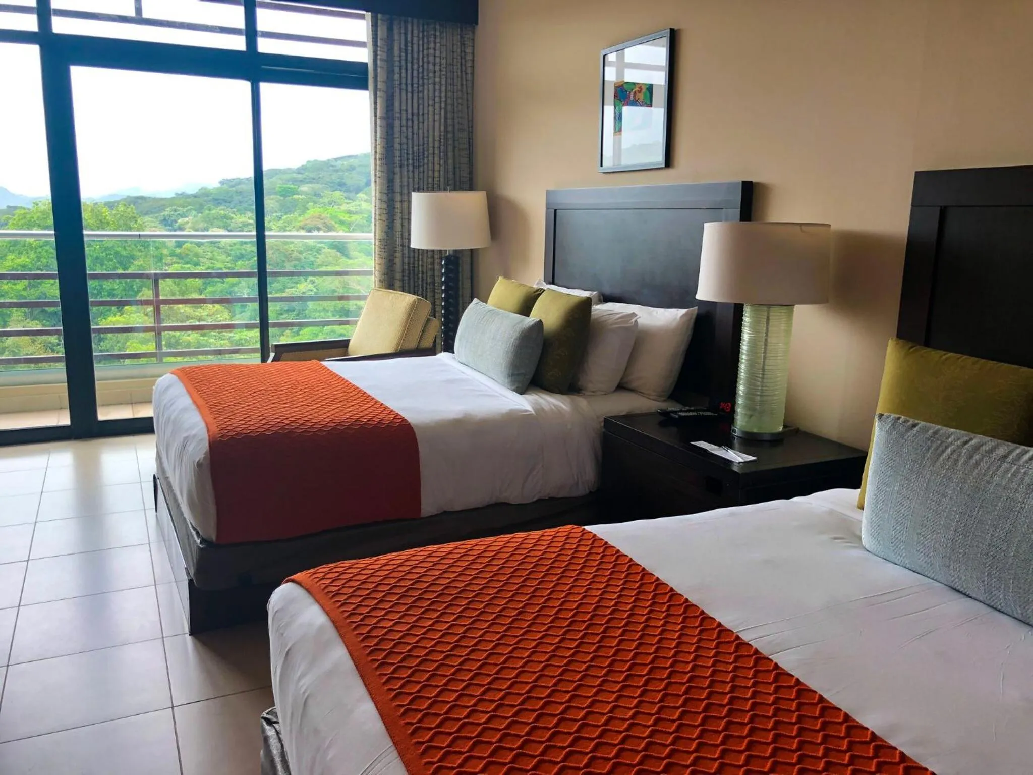 Bed in Summit Rainforest Golf Resort & All Inclusive