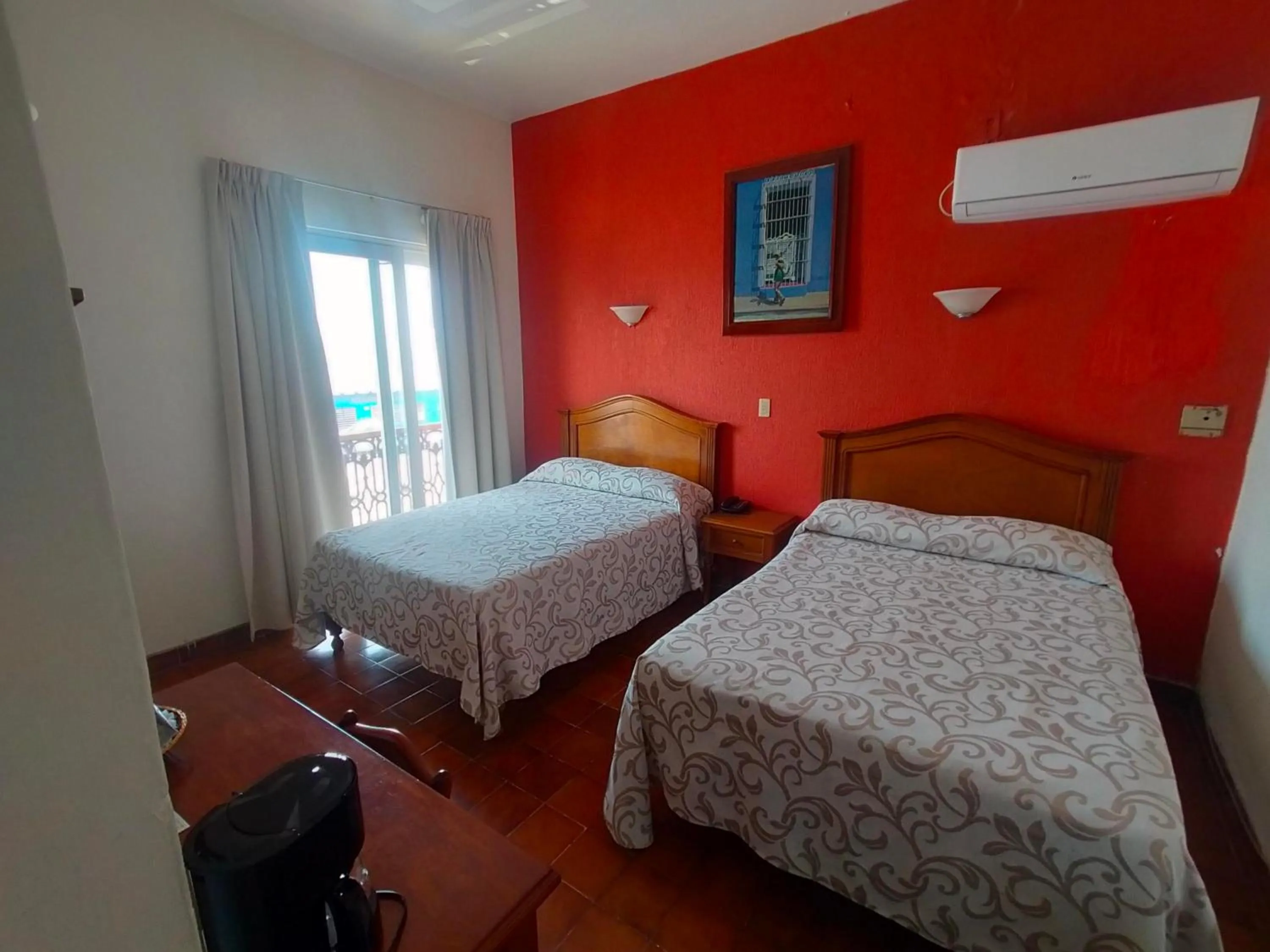 Bed in Hotel Posada Doña Lala