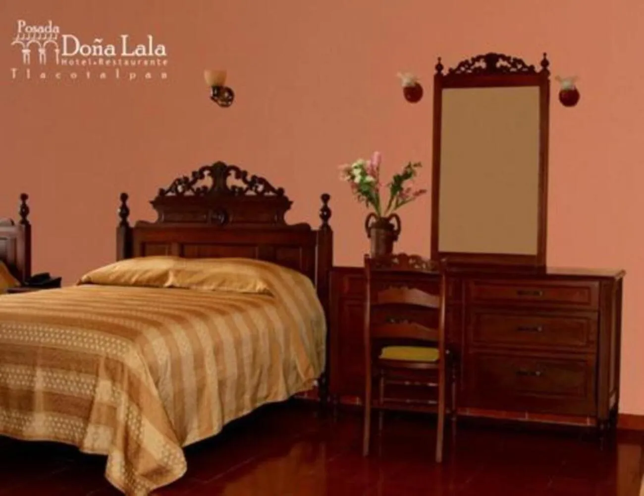 Bed in Hotel Posada Doña Lala