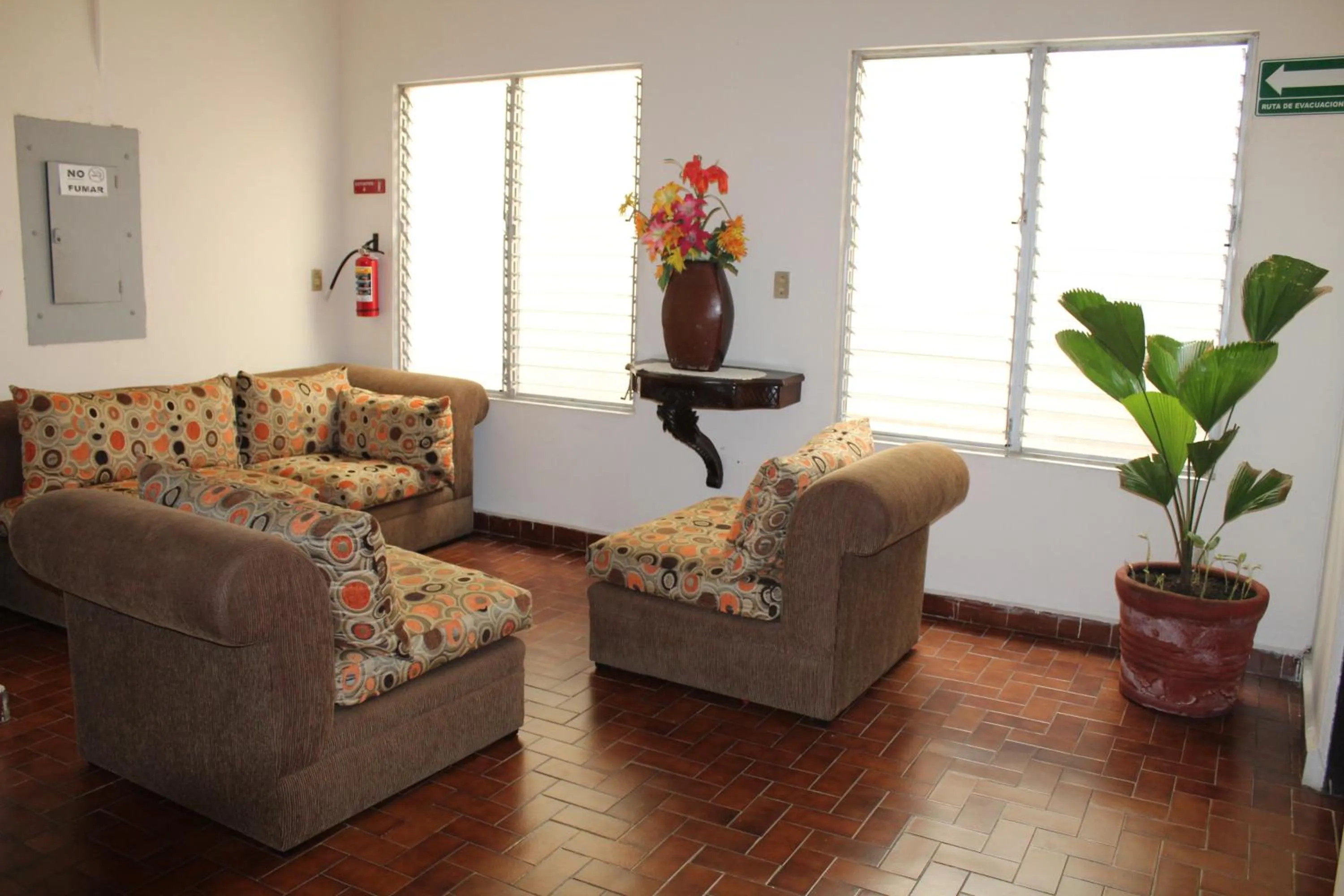 Communal lounge/ TV room in Hotel Posada Doña Lala