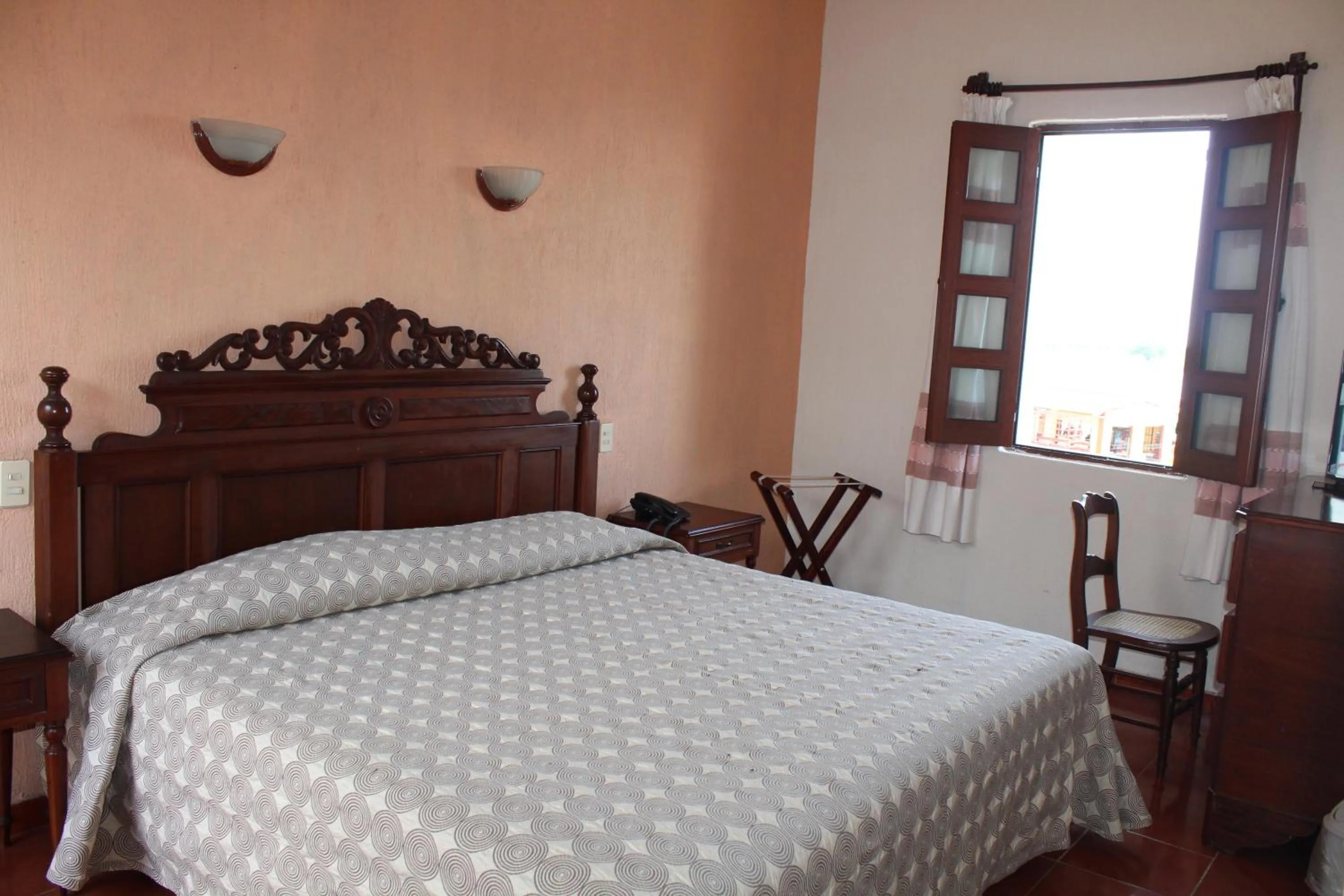Bed in Hotel Posada Doña Lala
