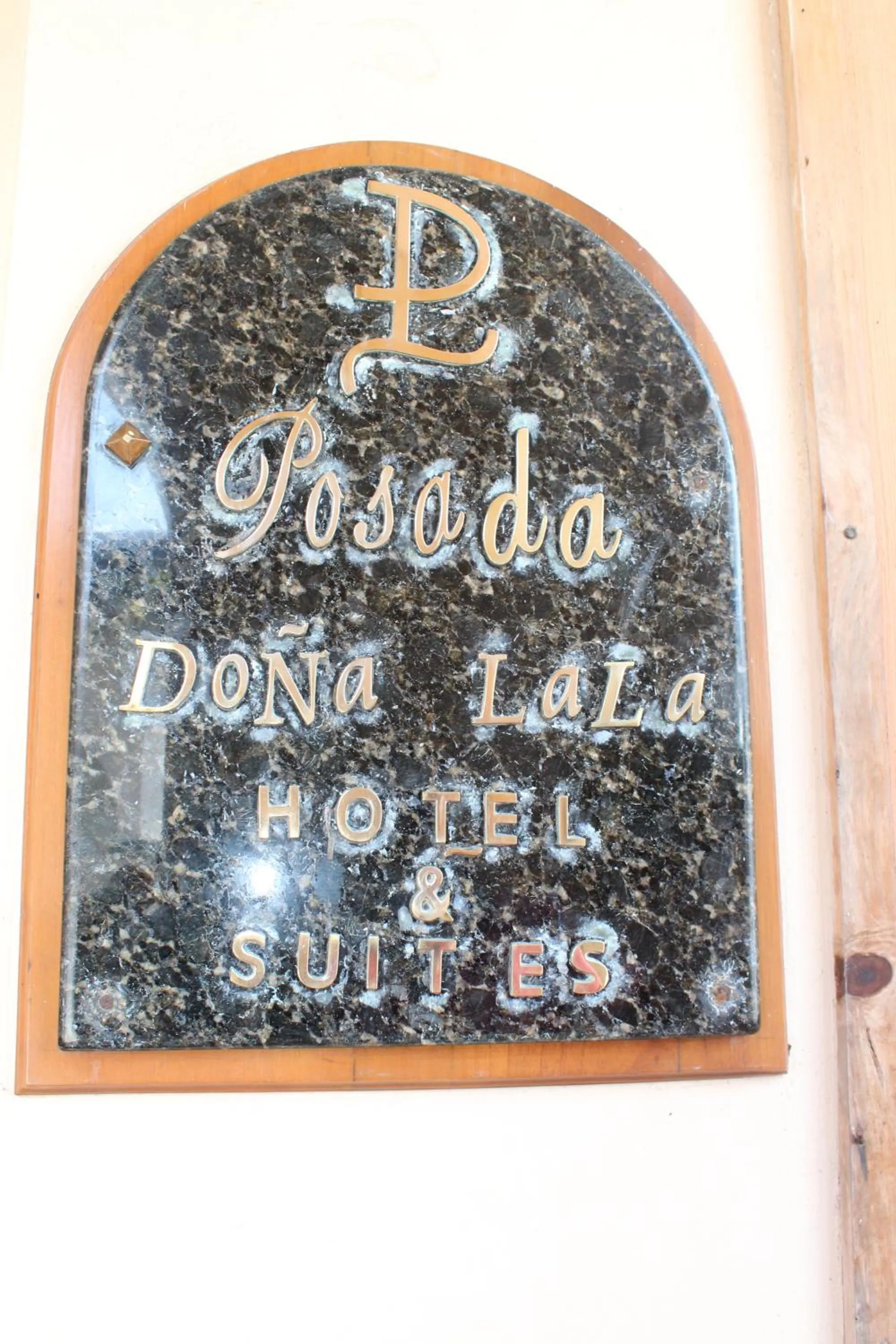 Property logo or sign in Hotel Posada Doña Lala