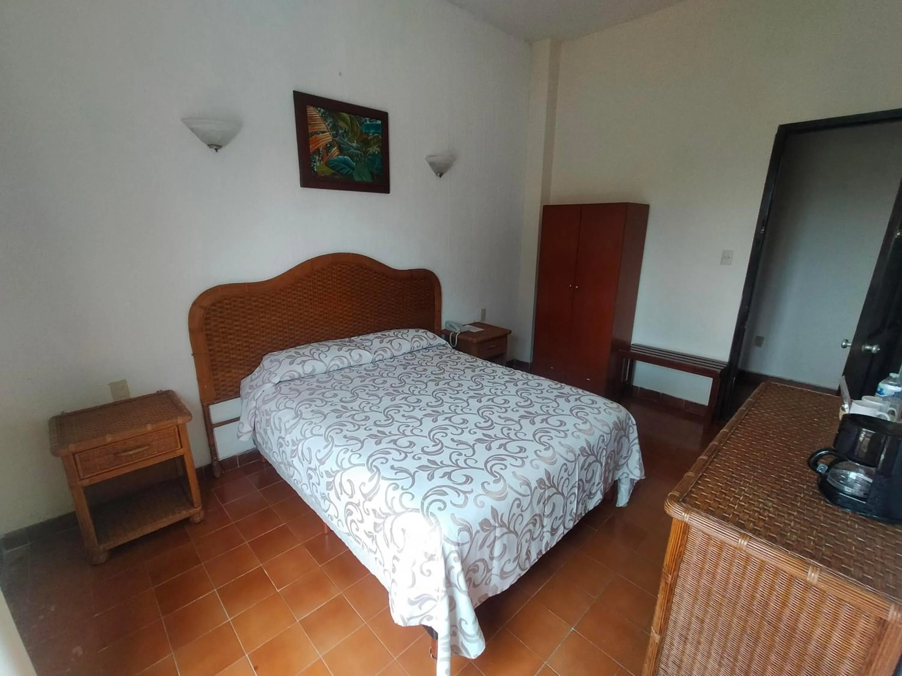 Bed in Hotel Posada Doña Lala