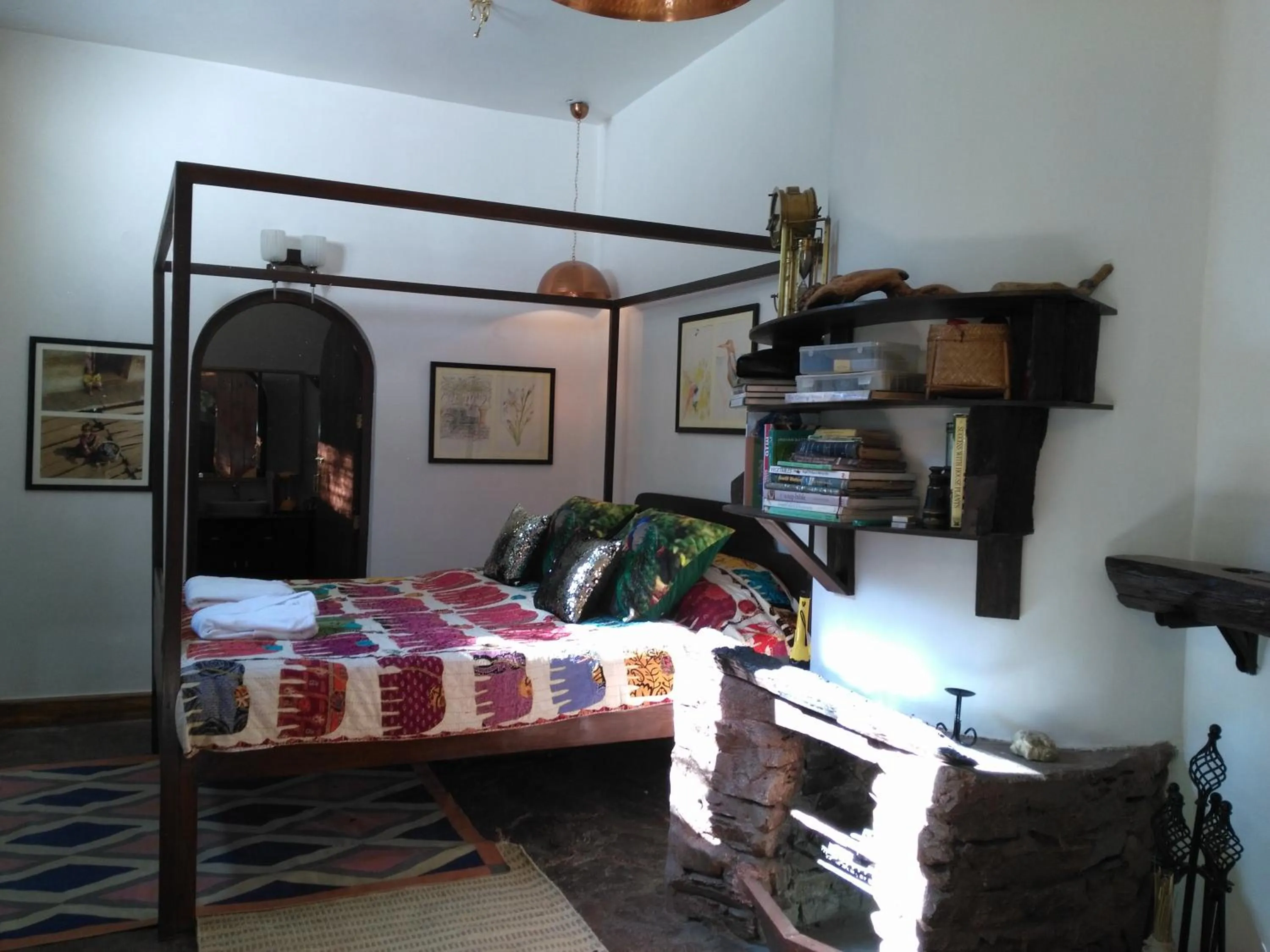 Decorative detail, Bed in Samira's Birds & Butterflies Park-Spashram Ganga Beach Retreat