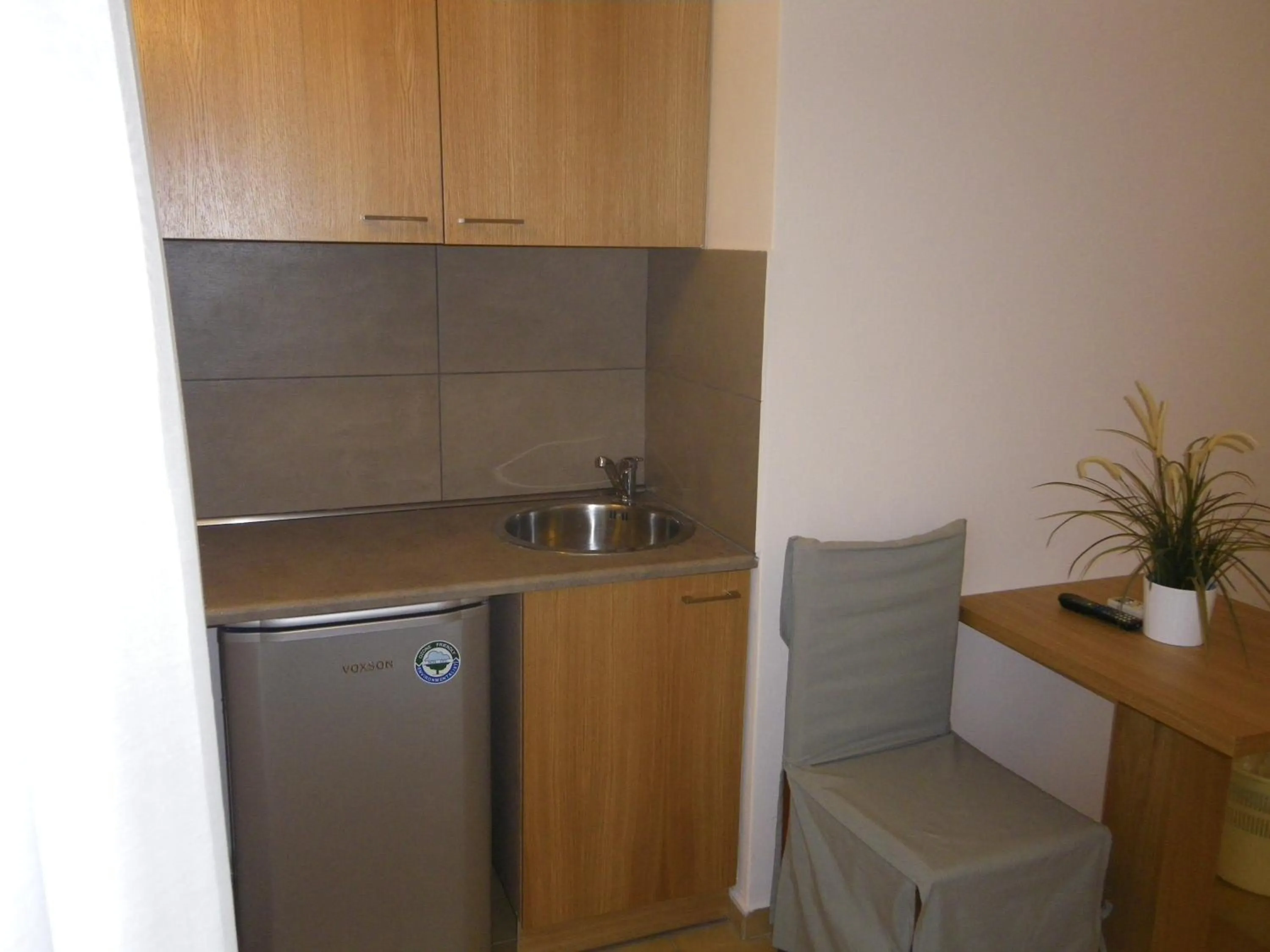 Kitchen or kitchenette in Byzance Hotel