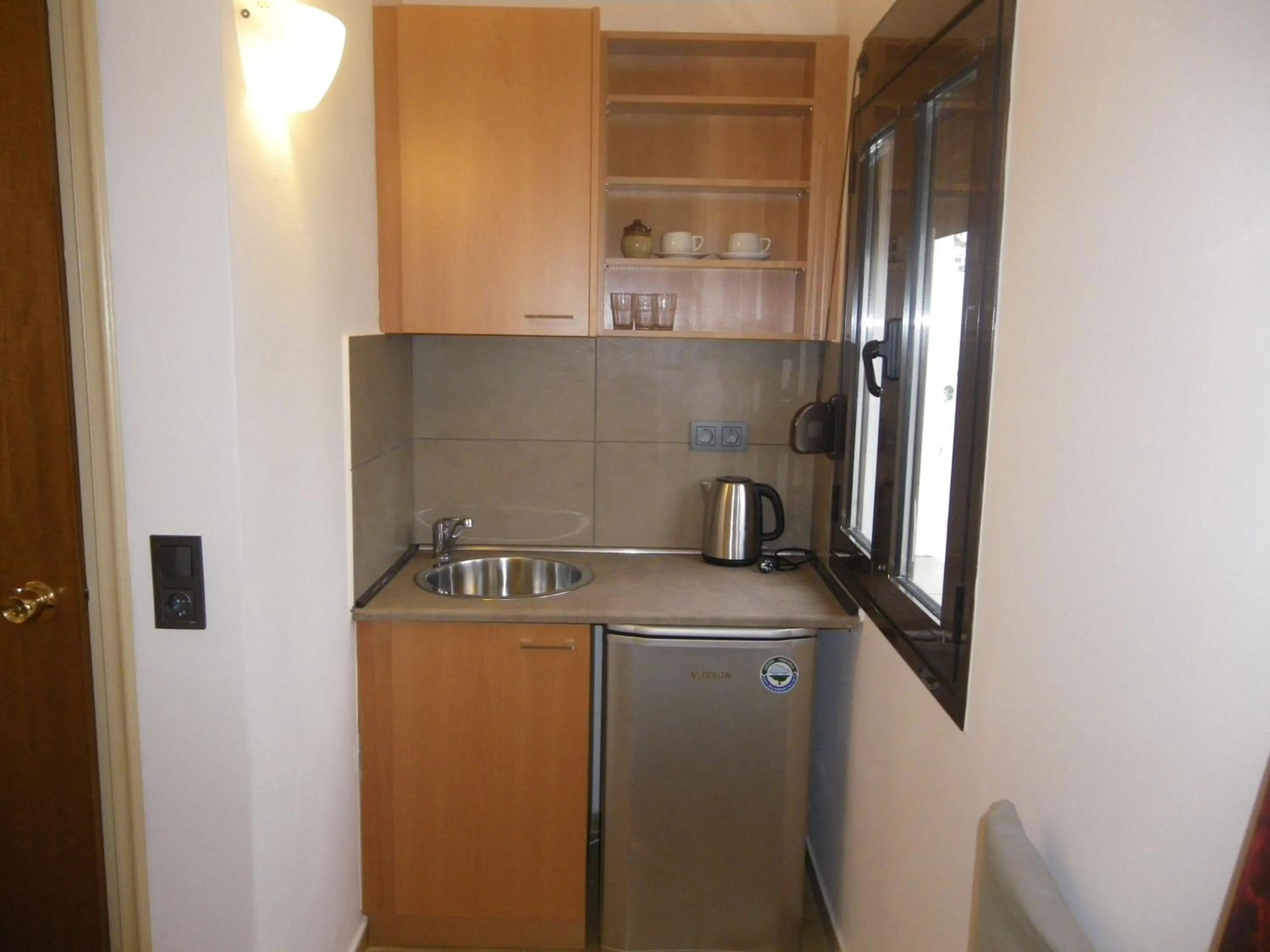 Kitchen or kitchenette in Byzance Hotel