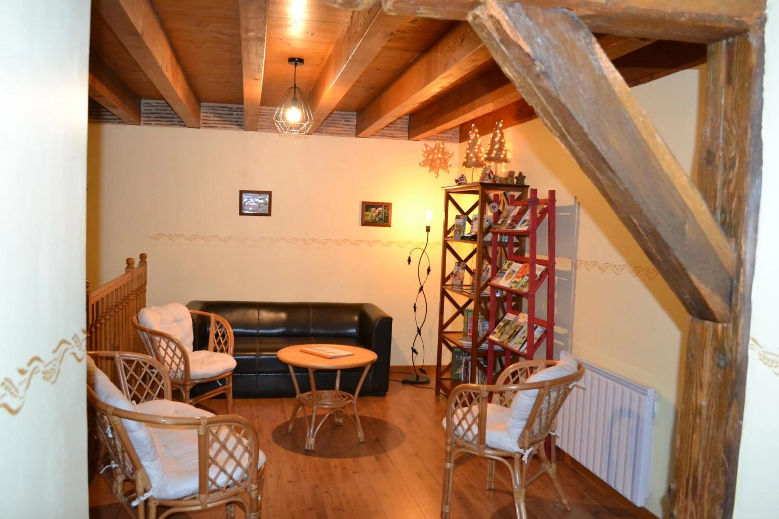 Seating area in Chambres d'Hôtes Le Moulin à Epices