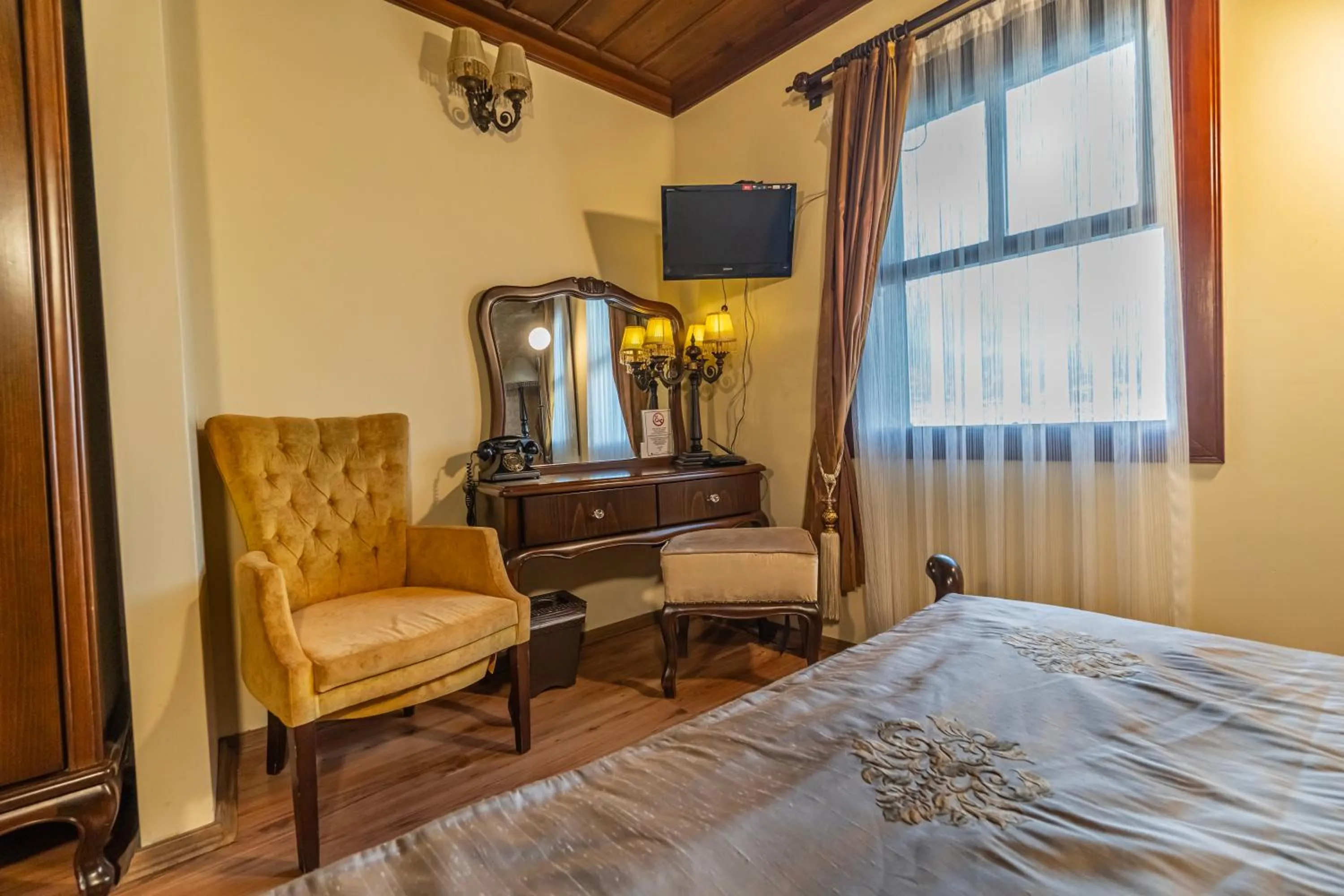 Seating area, Bed in Harmony Butik Otel