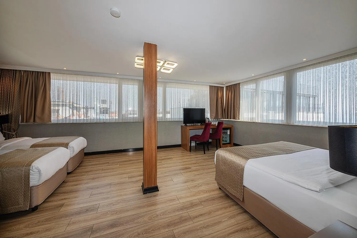 Bed in Aristocrat Hotel