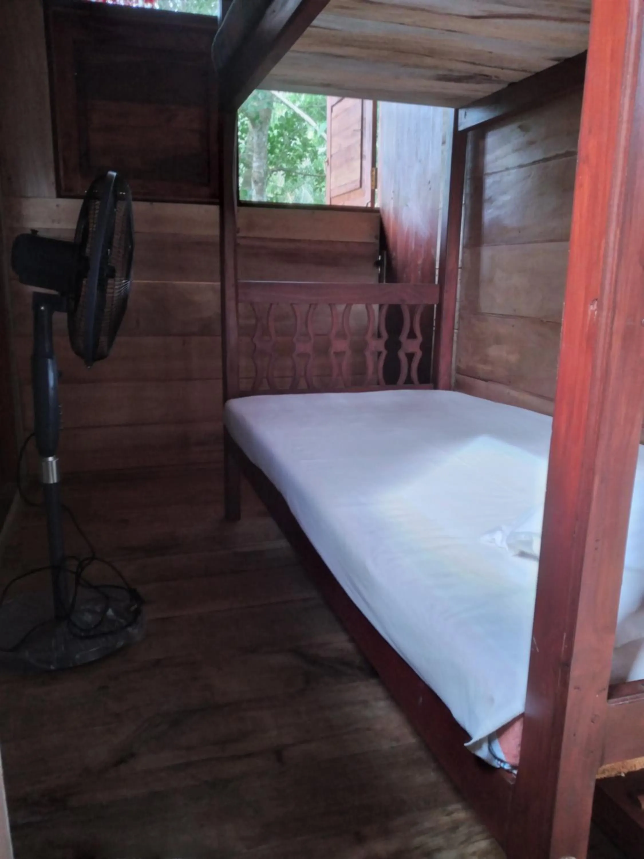 Bed in Green Herbal Ayurvedic Eco-Lodge