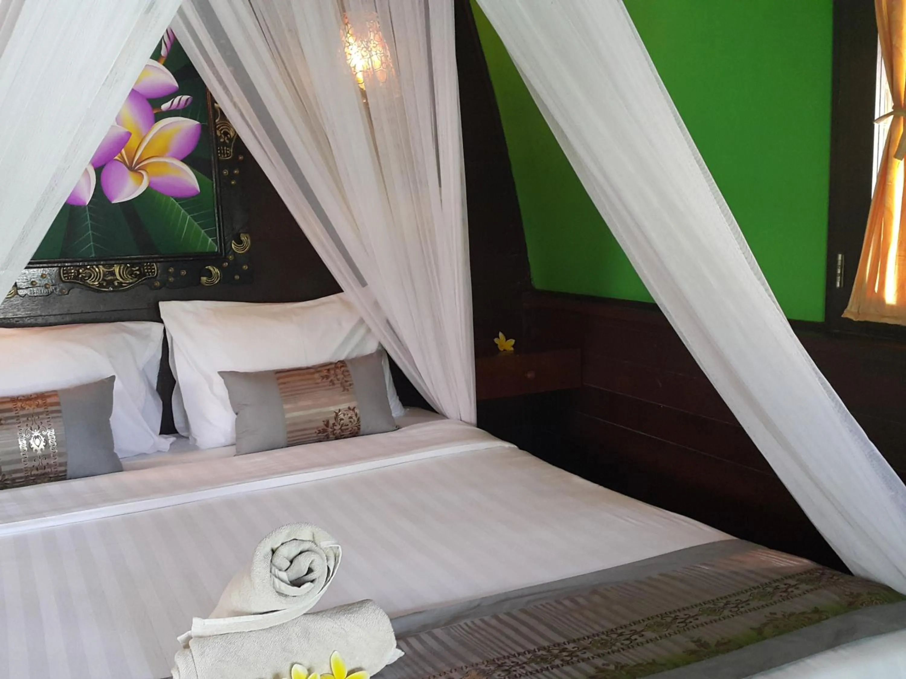 Bed in Nanuk's Bungalows