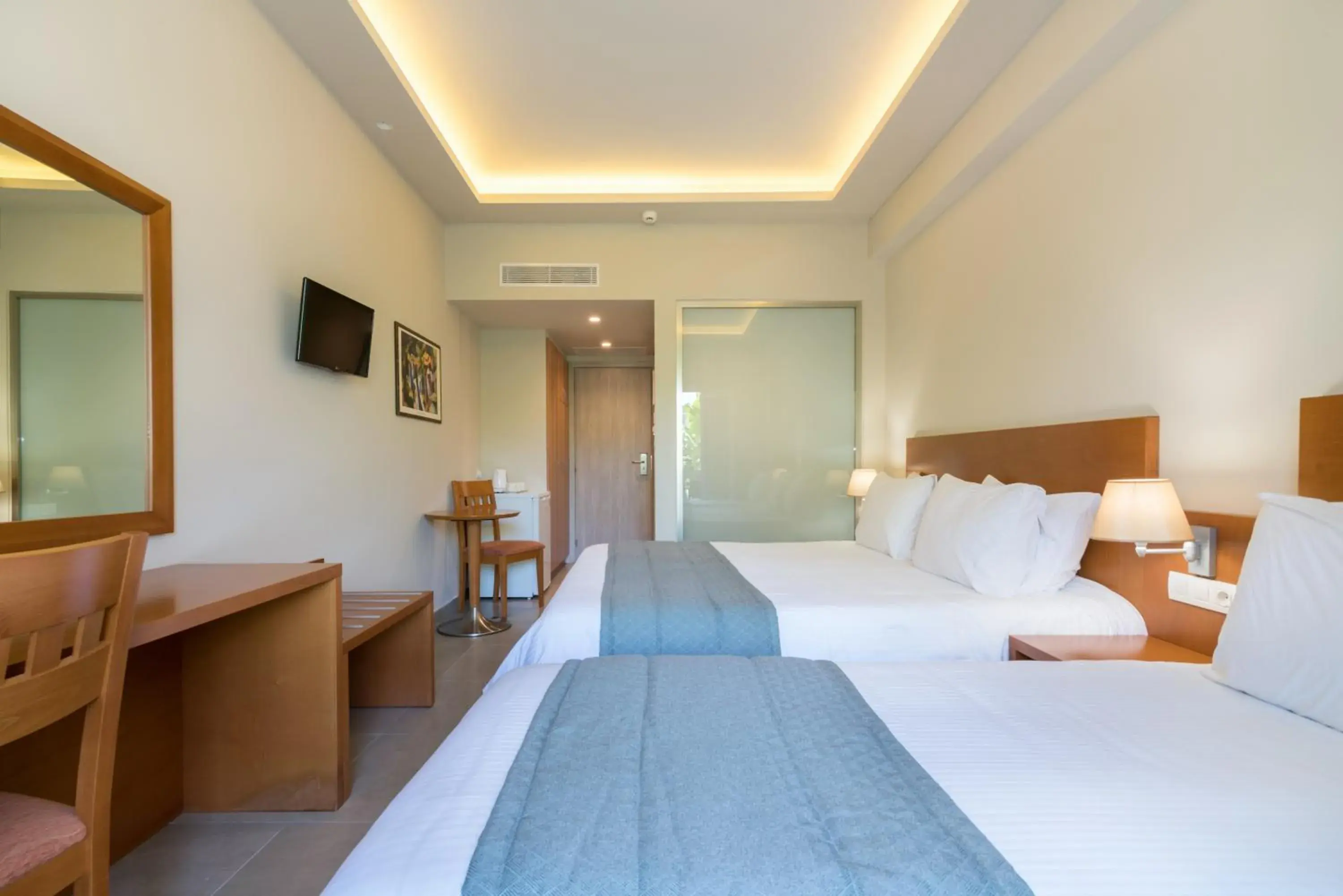 Triple Room with Garden View in Hotel Palmyra Triple Room with Garden View in Hotel Palmyra