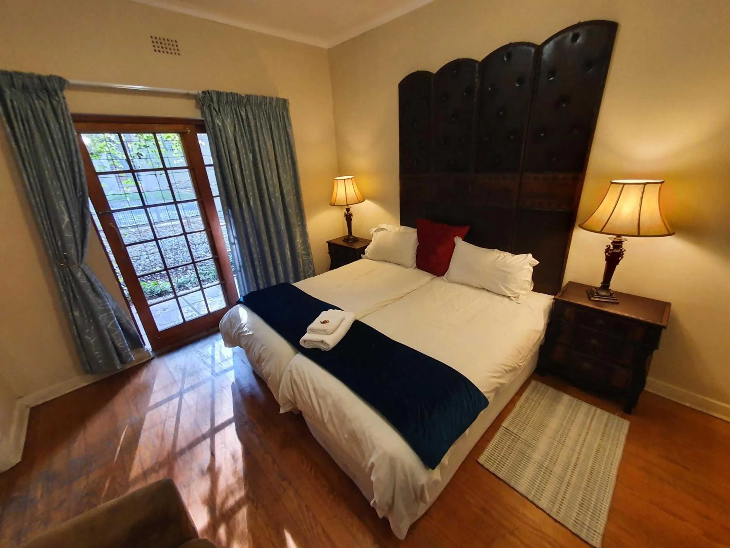 Bed in 7th Street Guesthouse