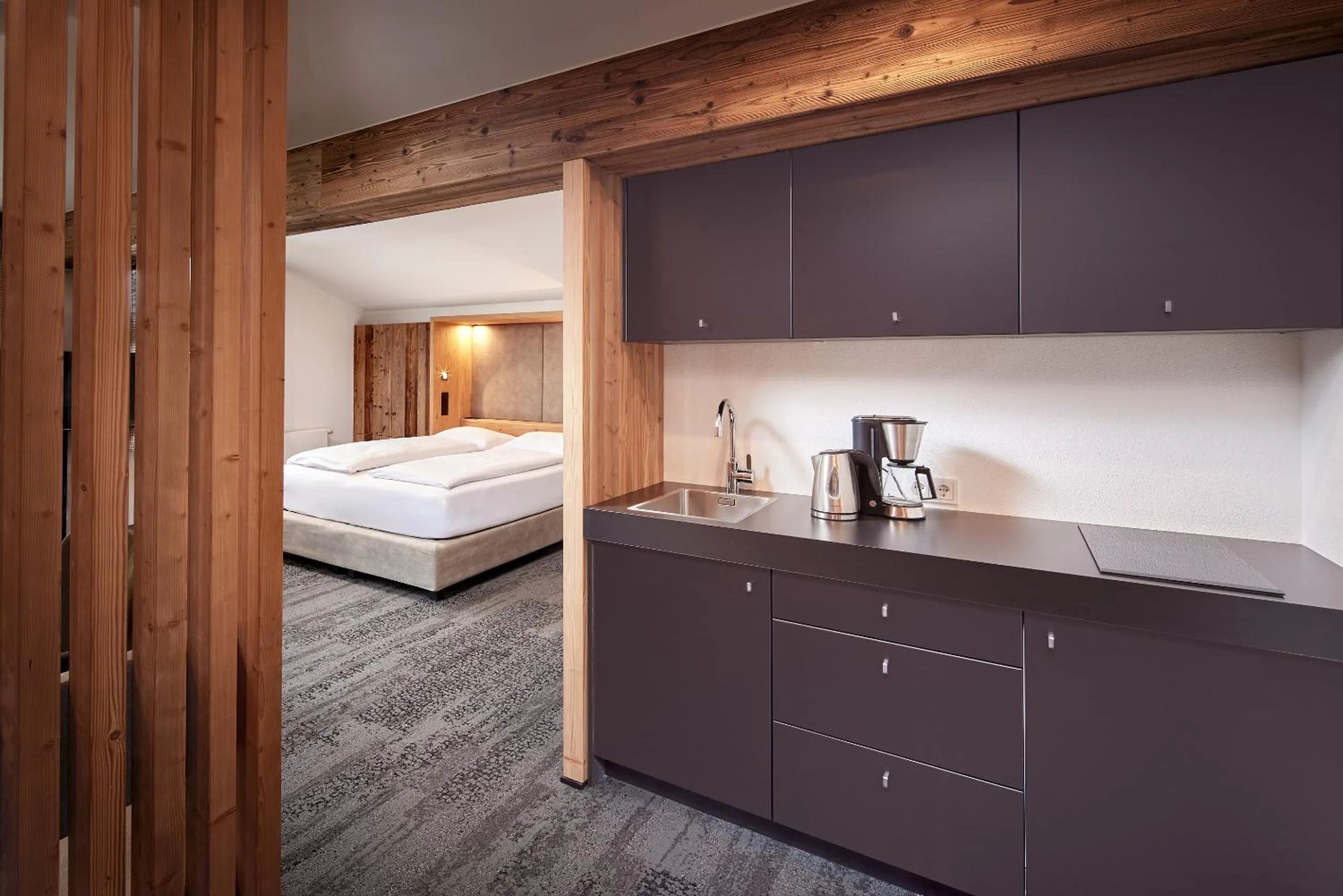 Kitchen or kitchenette, Bed in Hotel Gasthof Siggen