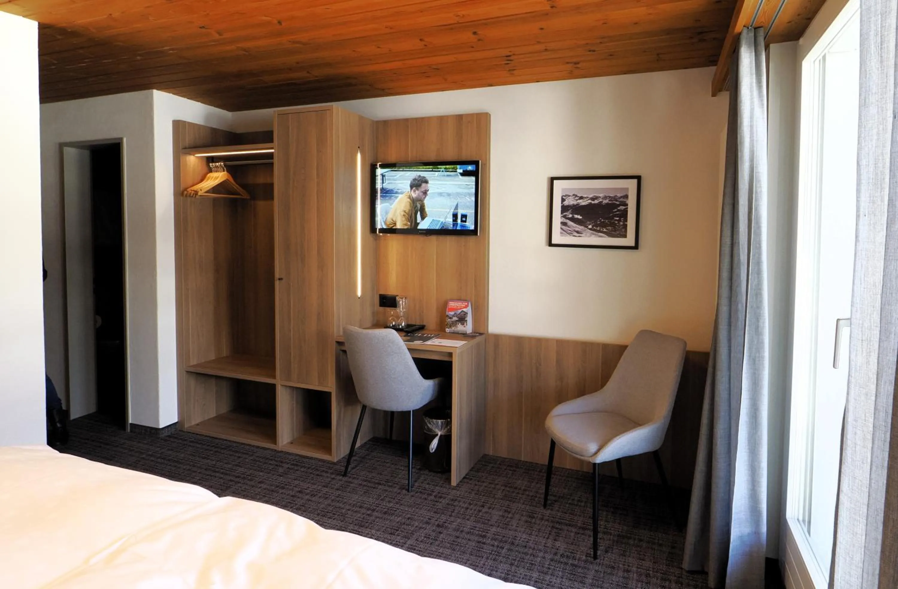 Photo of the whole room, Bed in Hotel Alpina Parpan