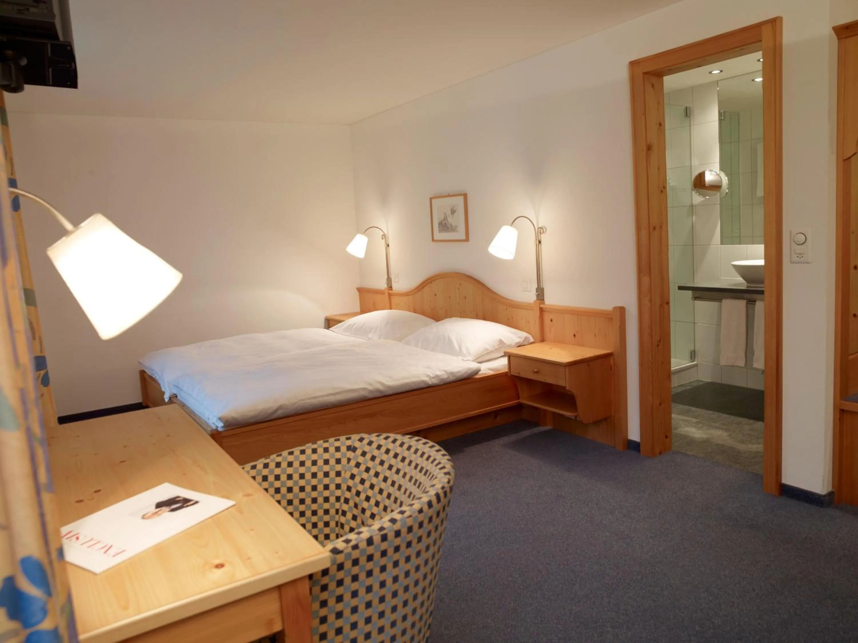 Photo of the whole room, Bed in Hotel Alpina Parpan