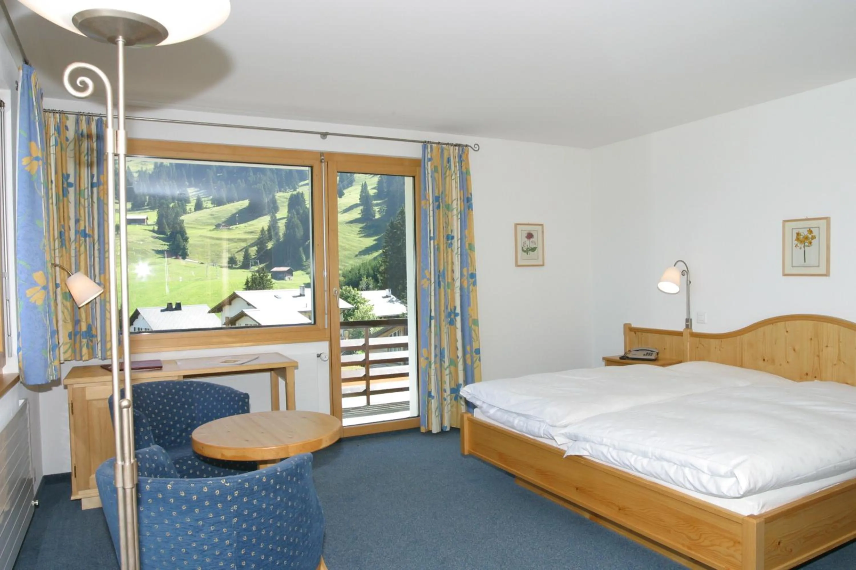 Photo of the whole room, Bed in Hotel Alpina Parpan