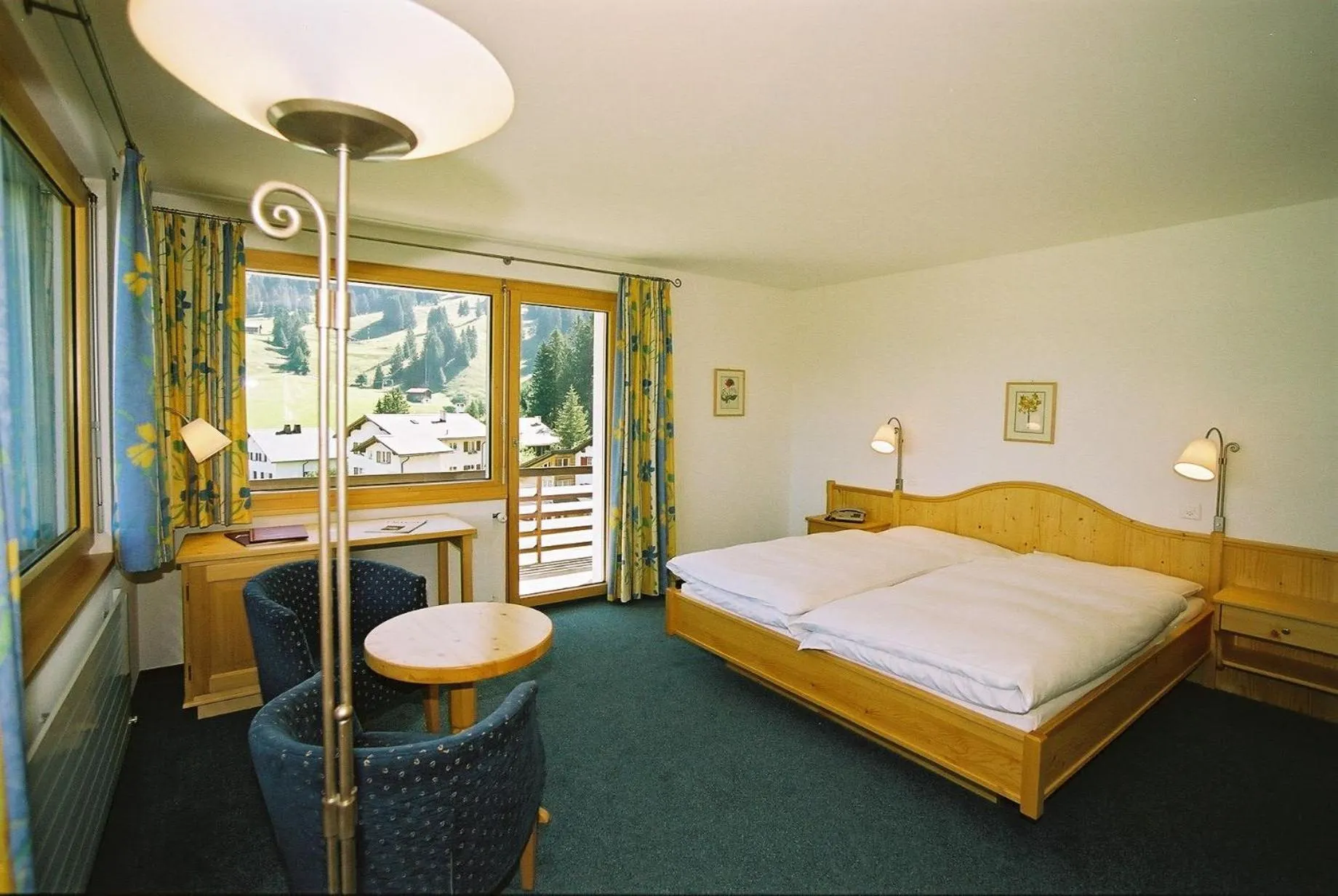 Photo of the whole room, Bed in Hotel Alpina Parpan