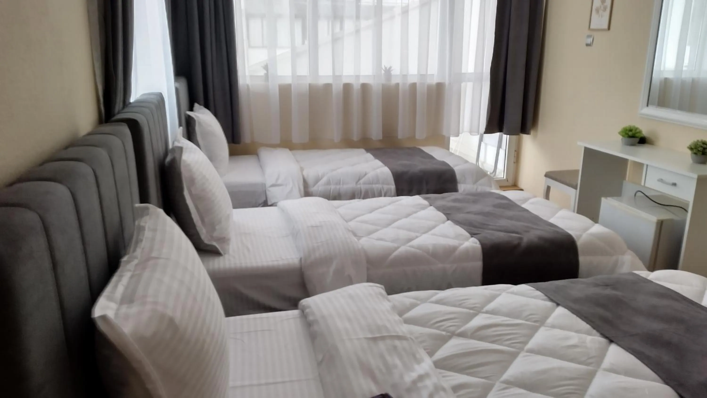 Bed in Victoria Family Hotel