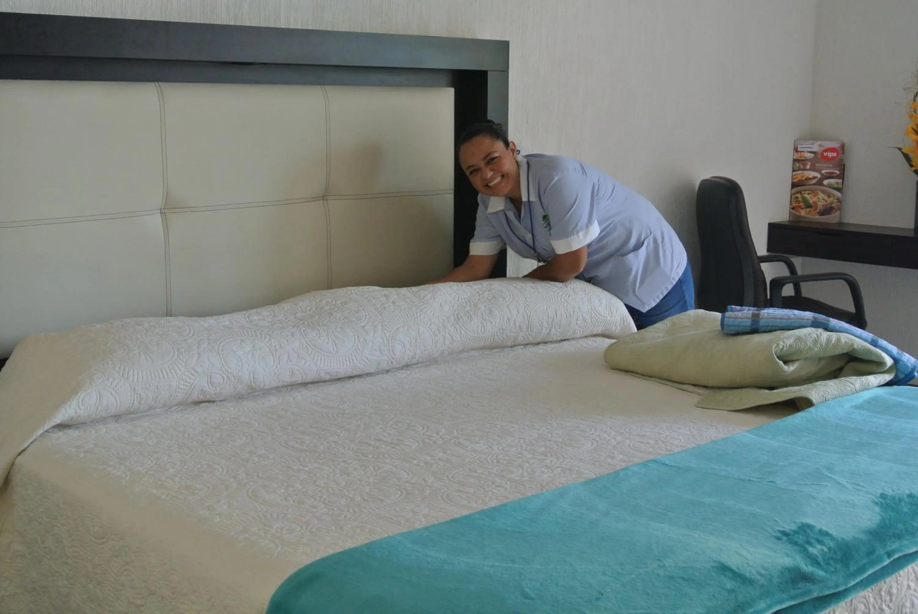 Bed in Parque Inn Hotel & Suites