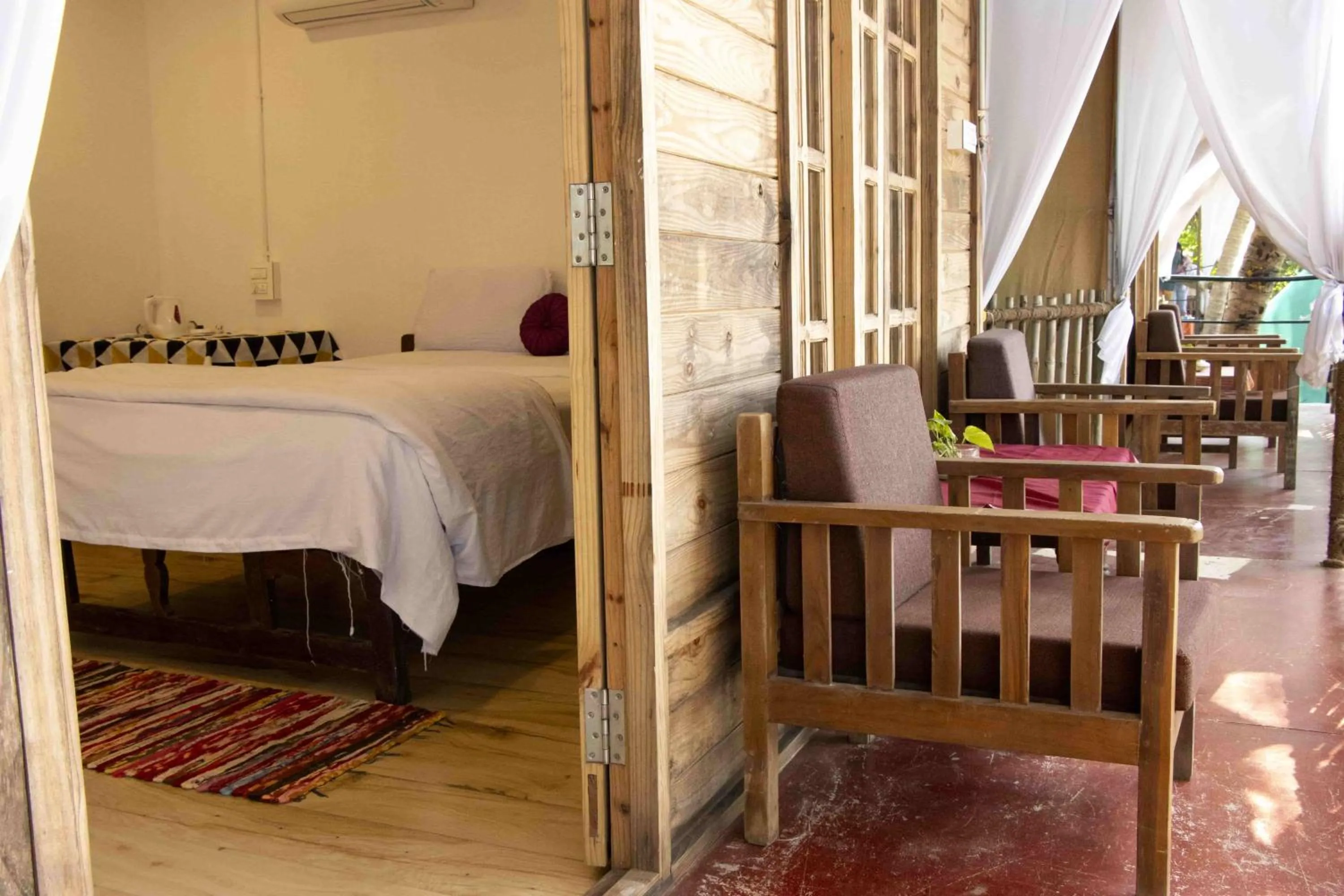 Balcony/Terrace, Bed in Secret Garden Agonda Beach Resort