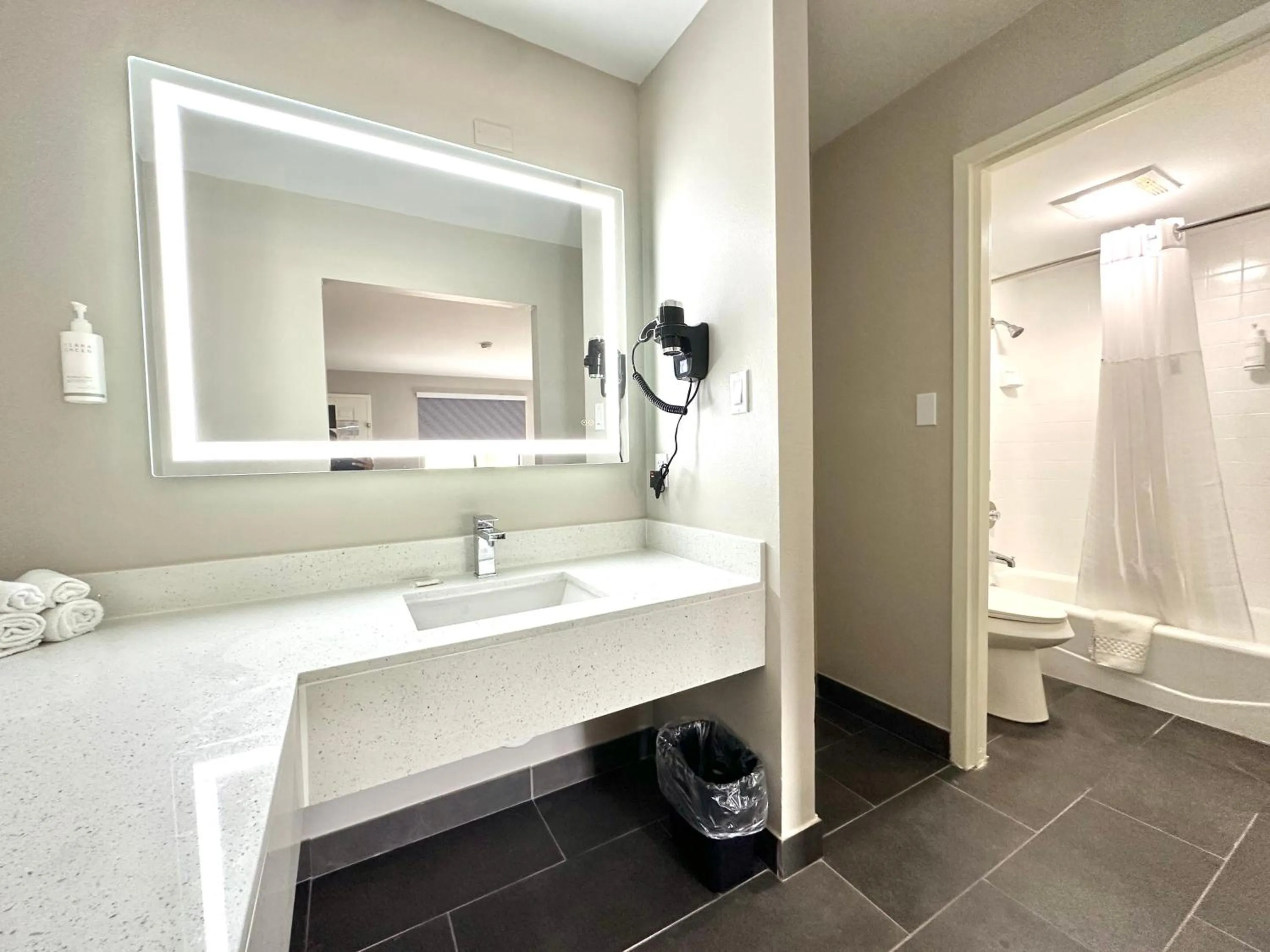 Bathroom in Days Inn & Suites by Wyndham Bossier City - Casino Area