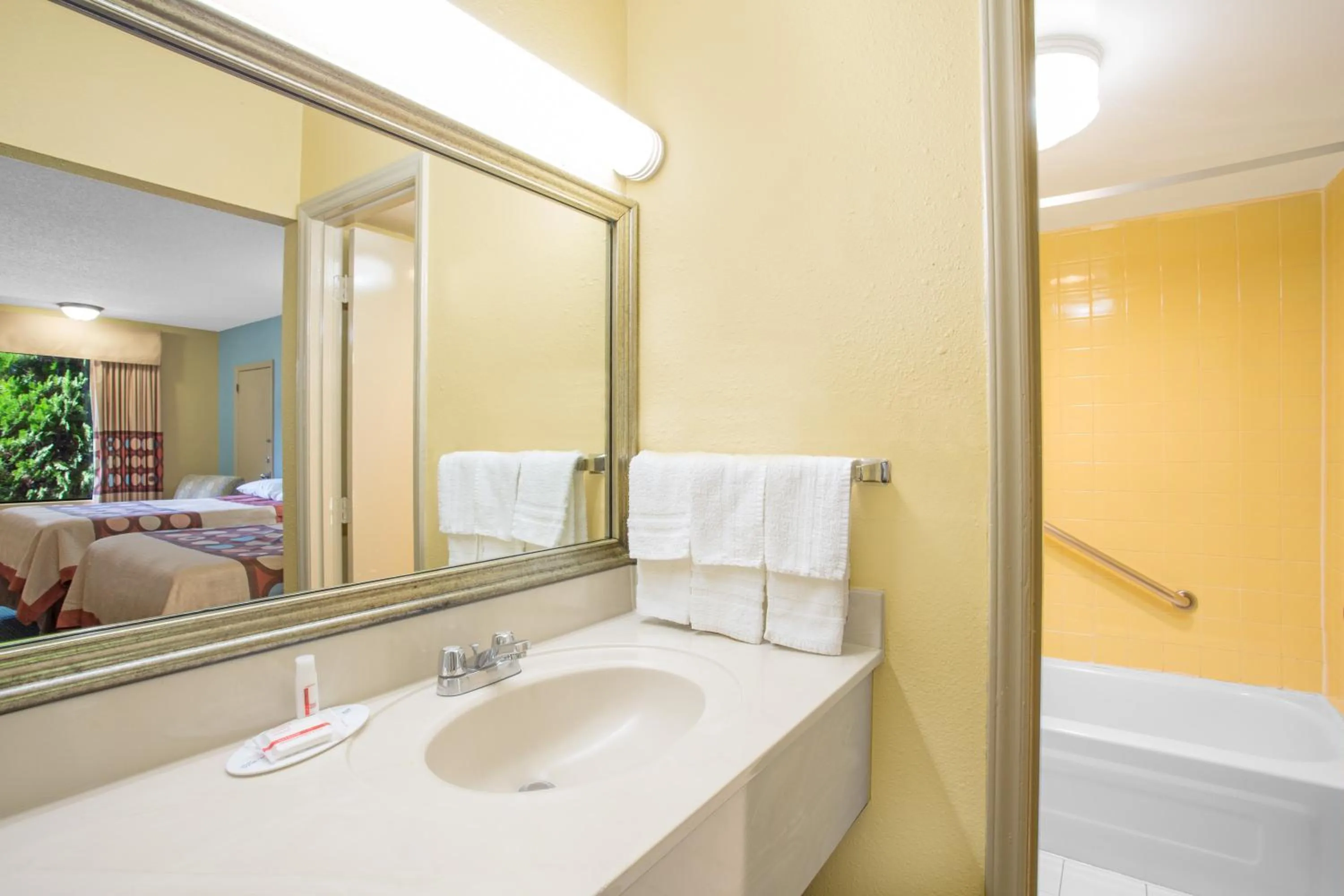 Bathroom in Super 8 by Wyndham Dunn