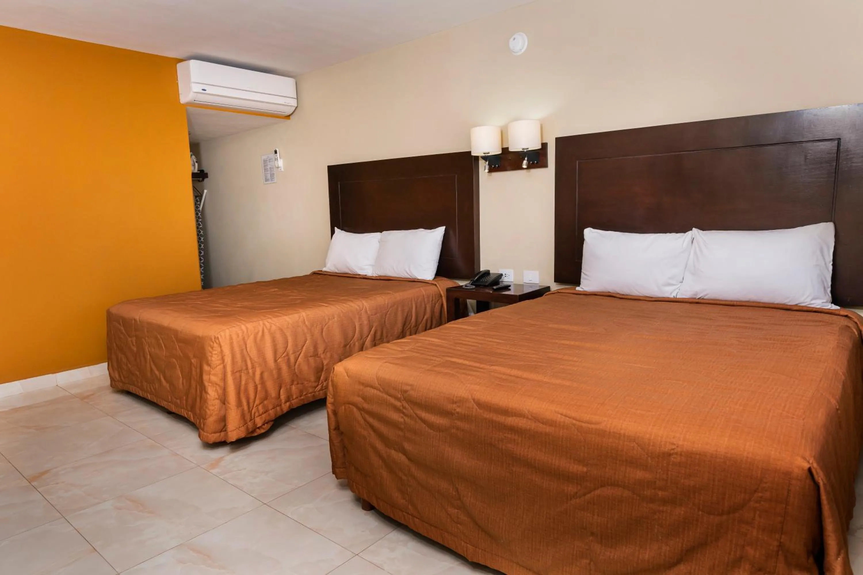 Bedroom in El Camino Hotel & Suites