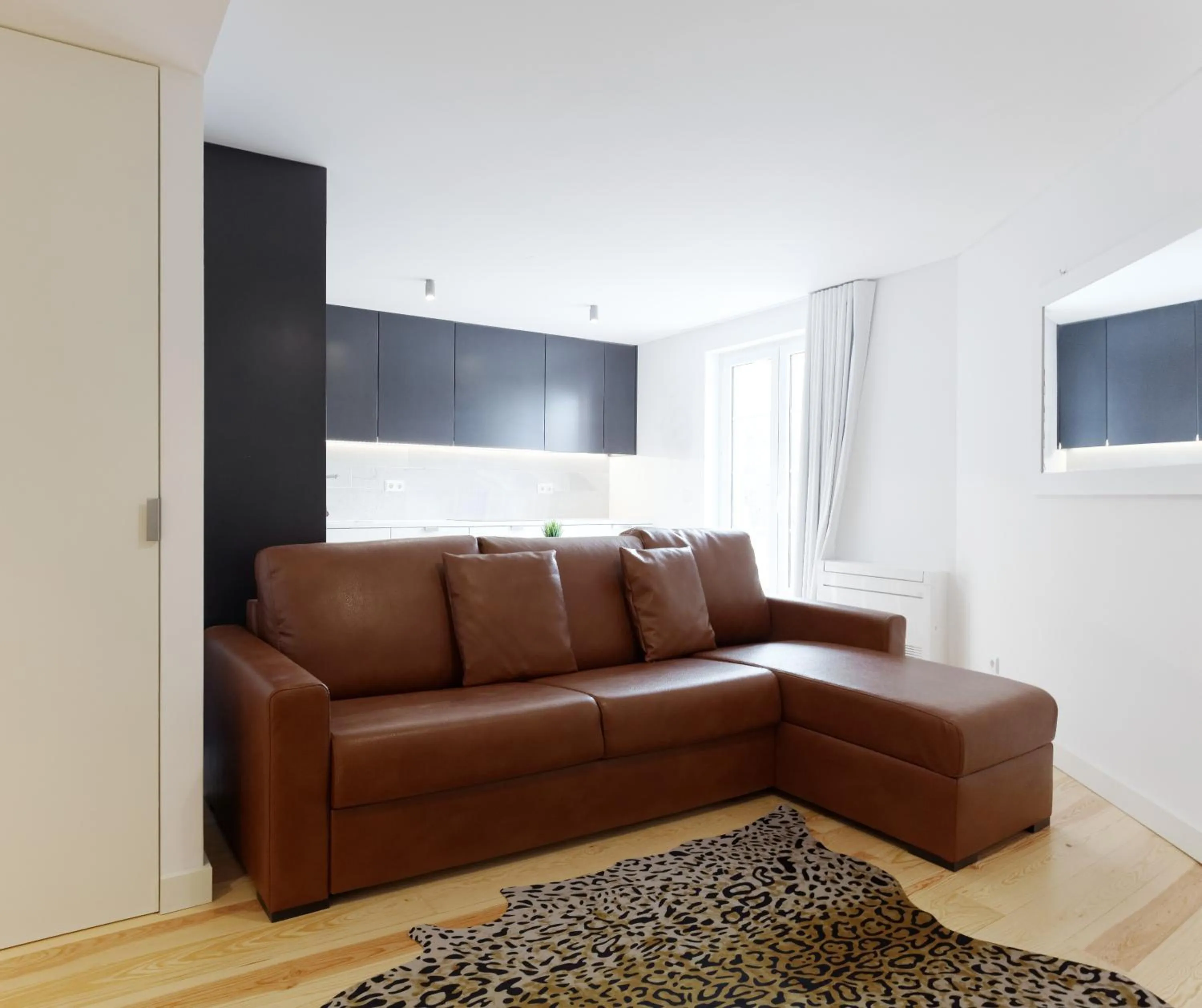 Kitchen or kitchenette in City Stays Alegria Apartments