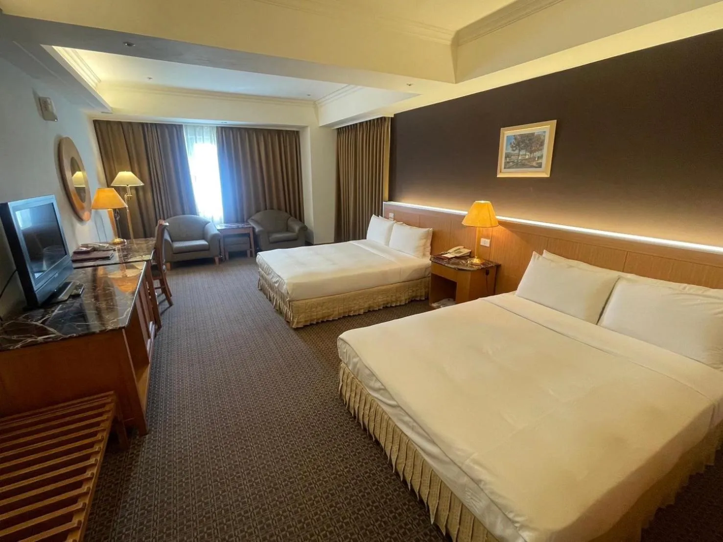 Bed in Chuto Plaza Hotel