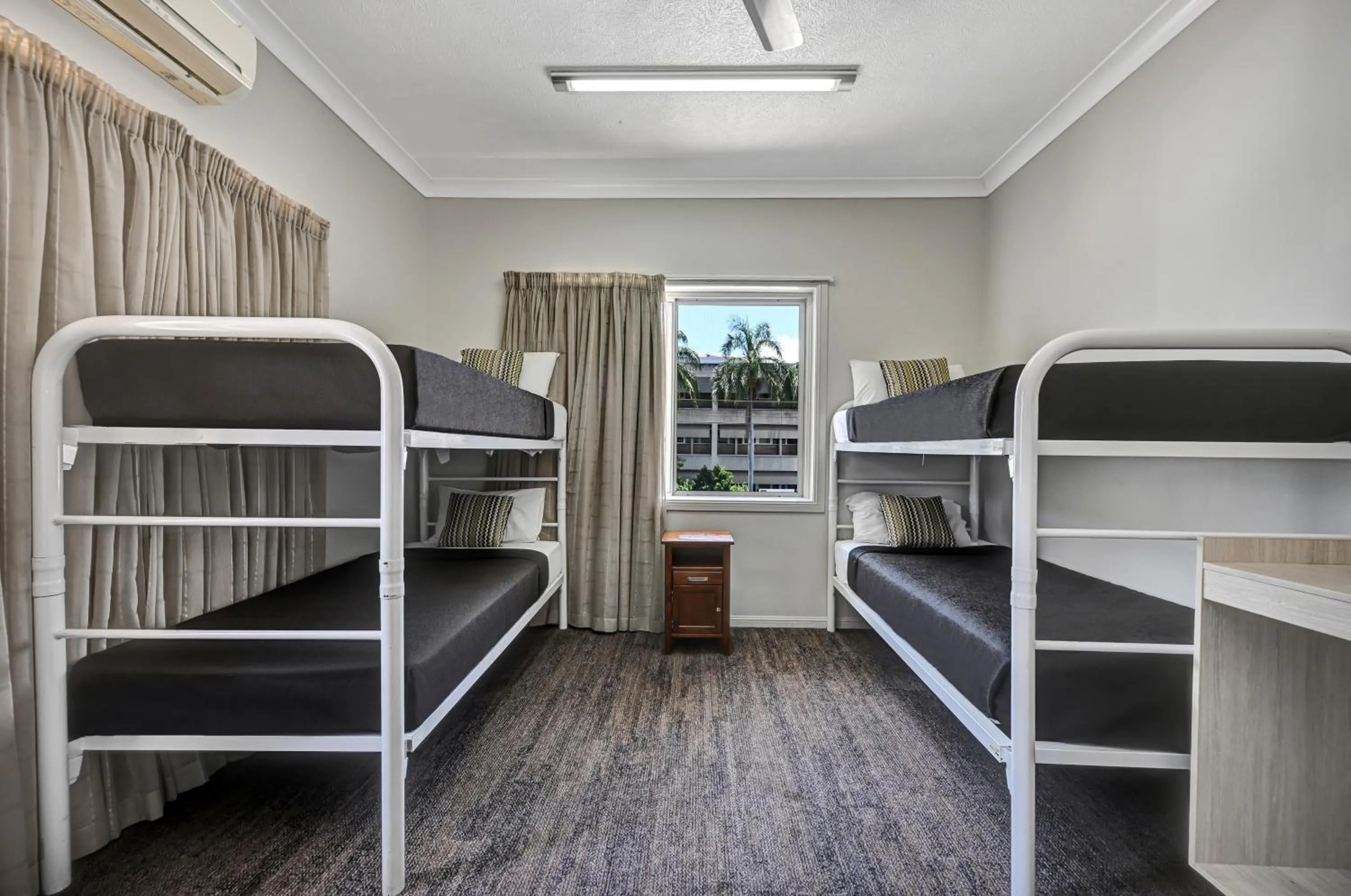 Bed in City Oasis Inn Townsville, SureStay Collection by BW