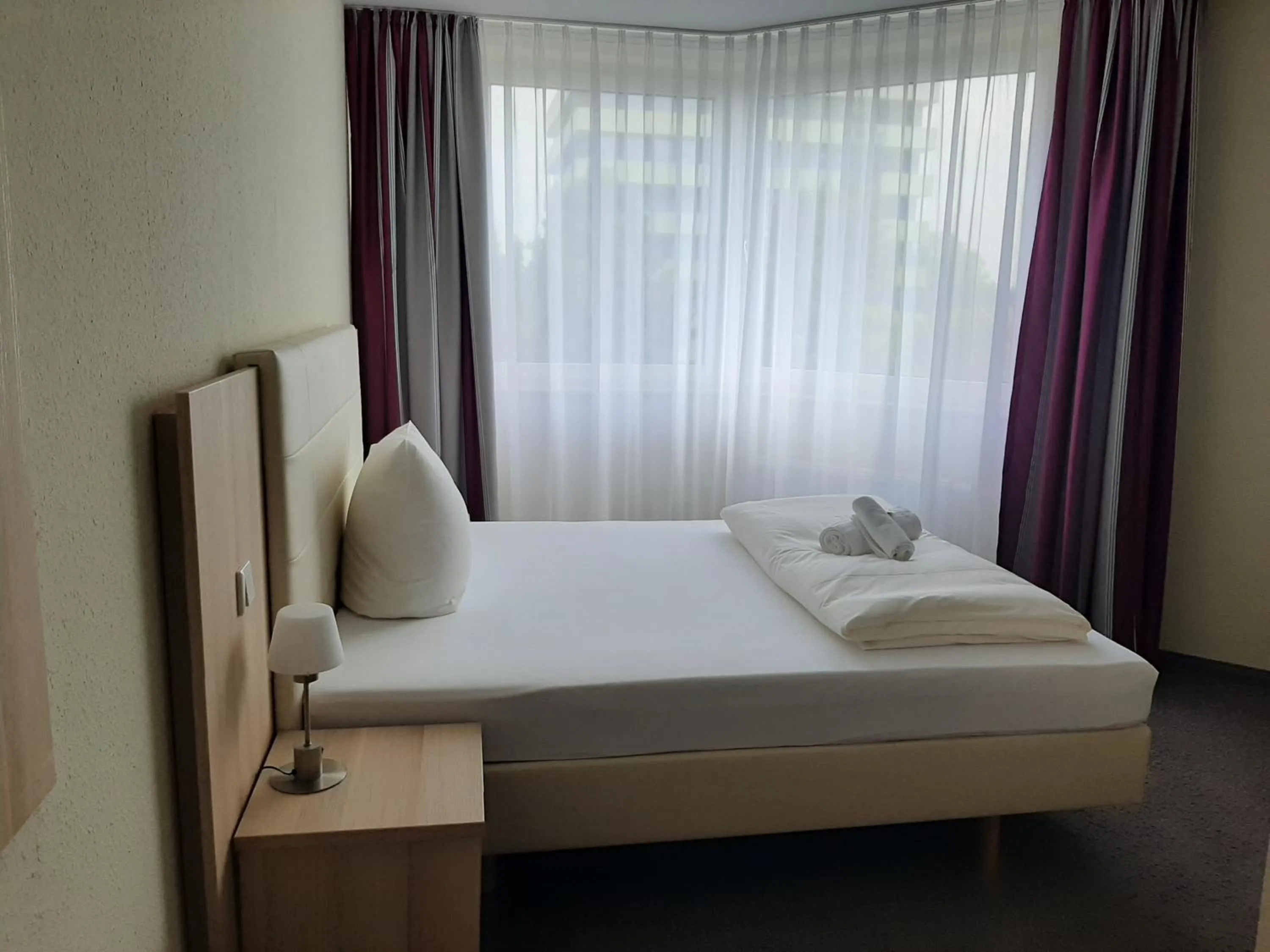 Bed in Hotel Siebenschläfer am Wasserturm