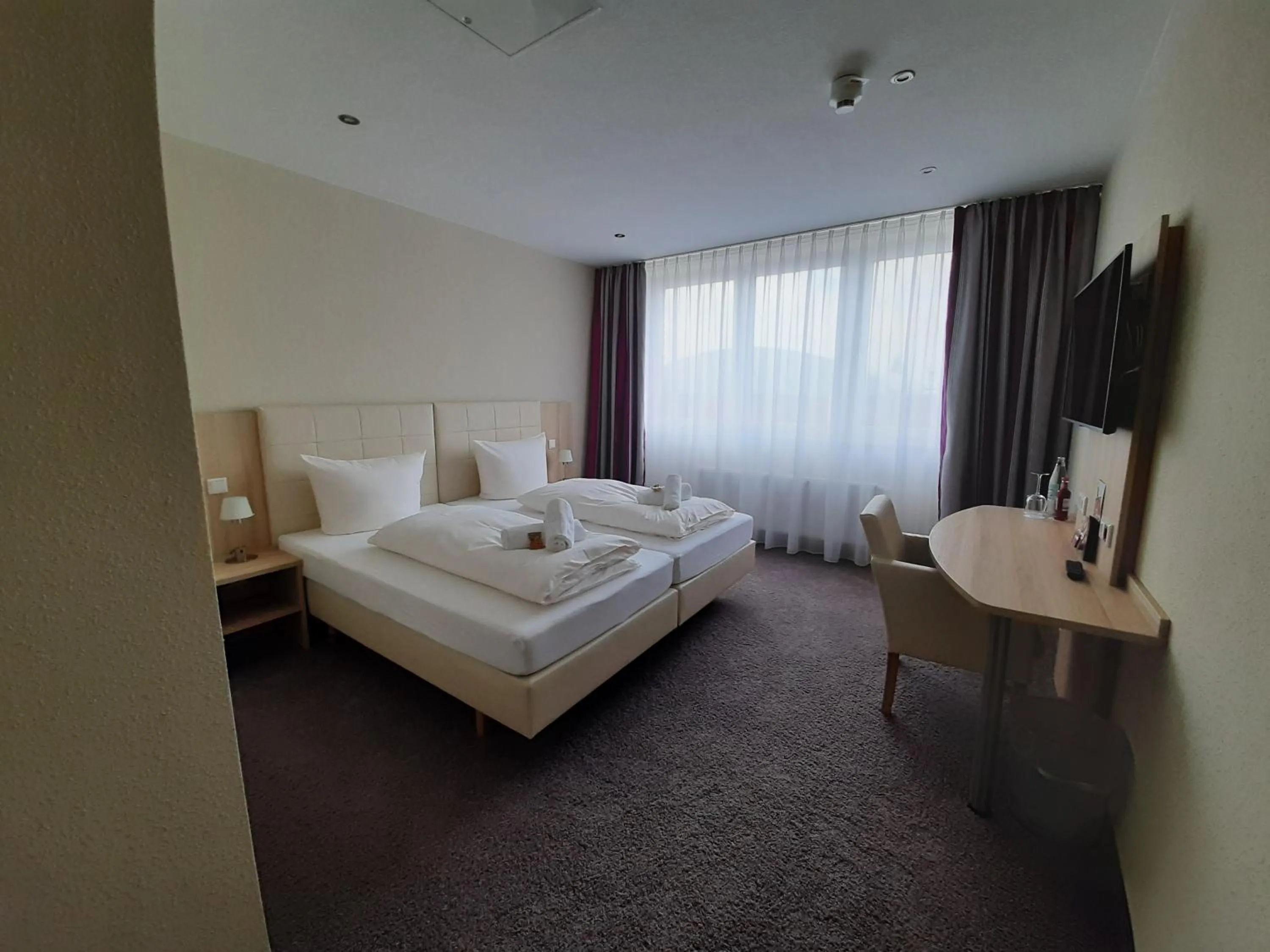 Bed in Hotel Siebenschläfer am Wasserturm