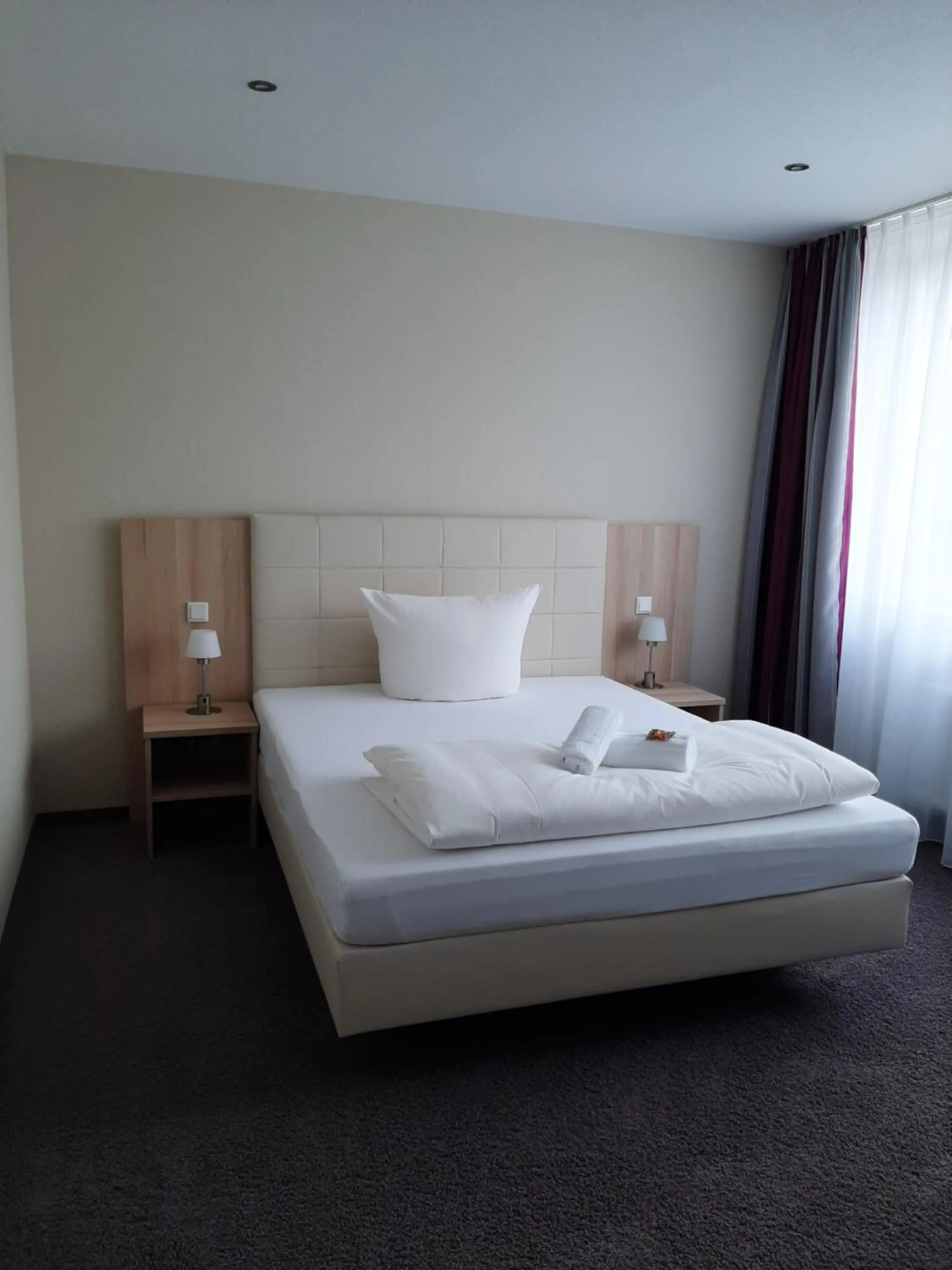 Bed in Hotel Siebenschläfer am Wasserturm