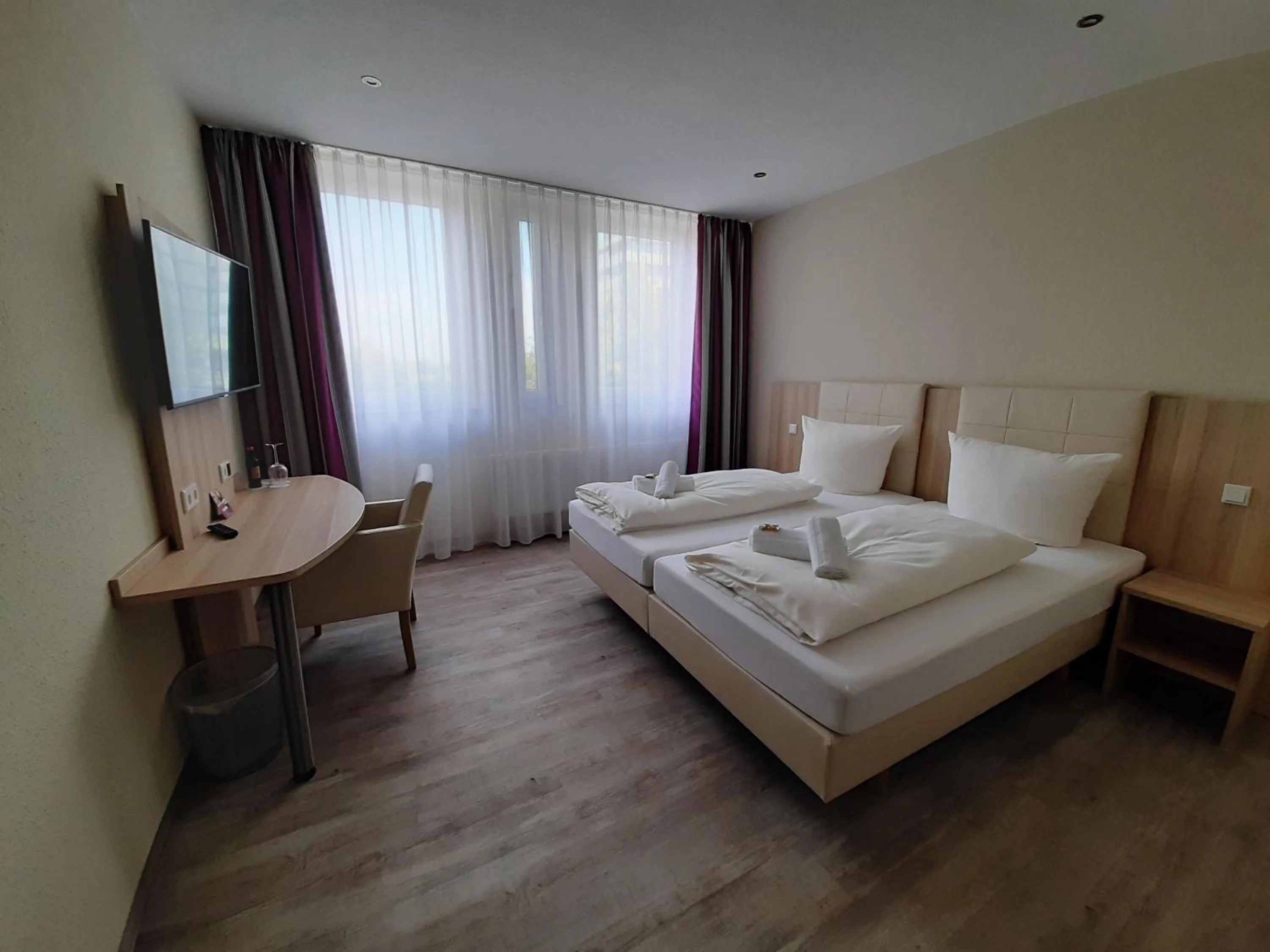 Photo of the whole room, Bed in Hotel Siebenschläfer am Wasserturm