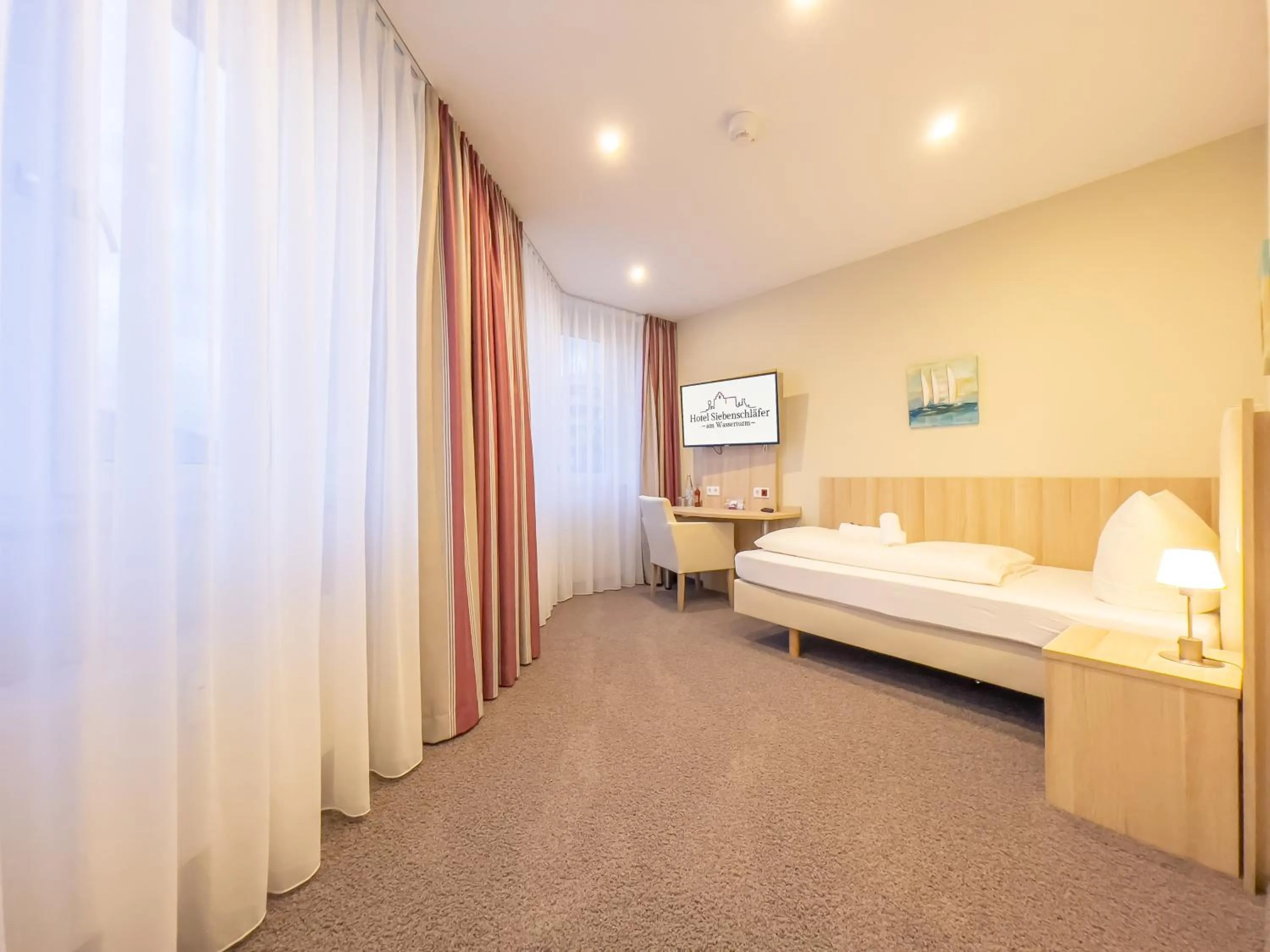 Bed in Hotel Siebenschläfer am Wasserturm