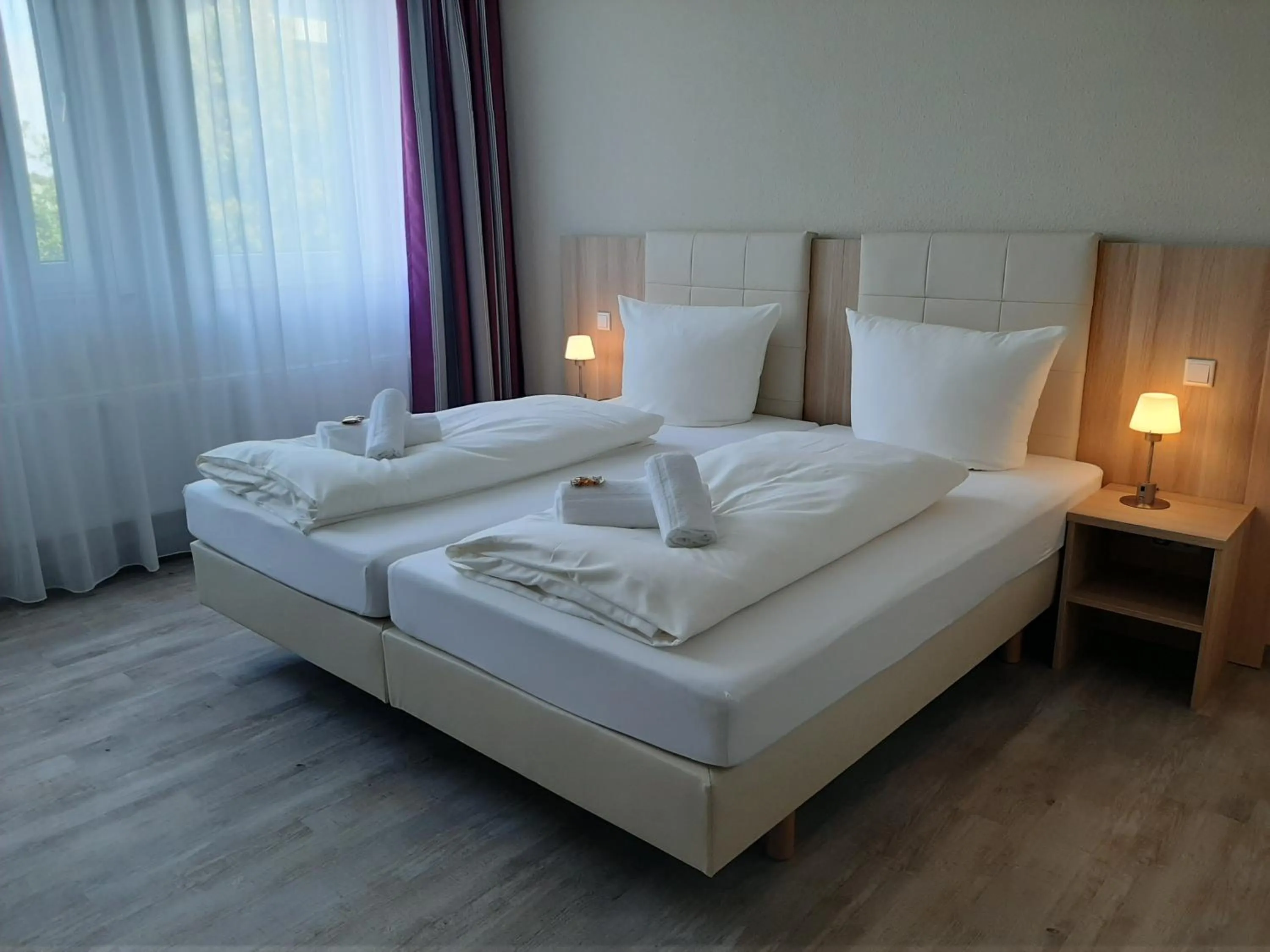 Photo of the whole room, Bed in Hotel Siebenschläfer am Wasserturm