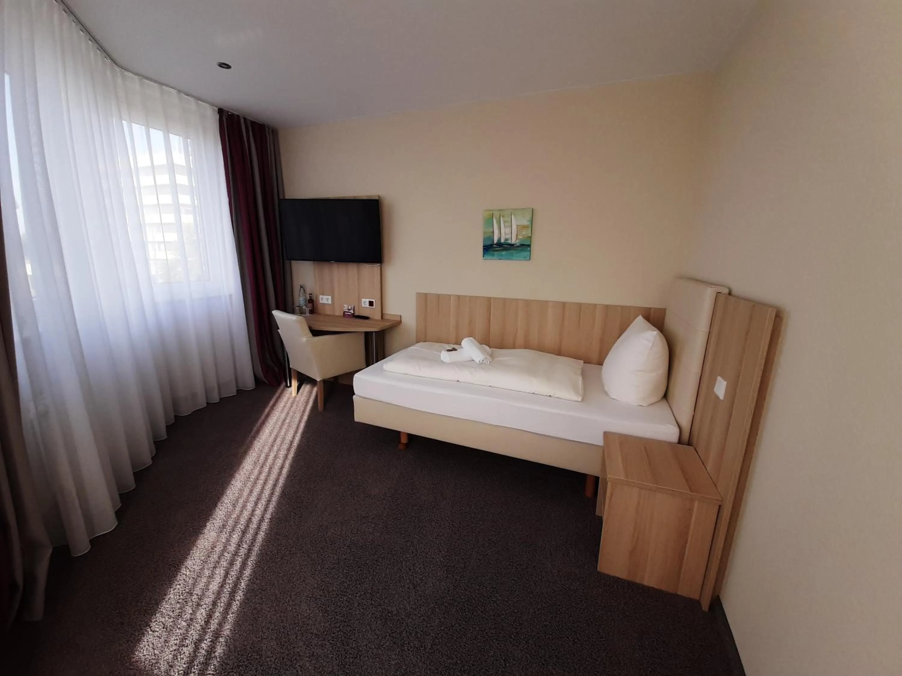 Bed in Hotel Siebenschläfer am Wasserturm