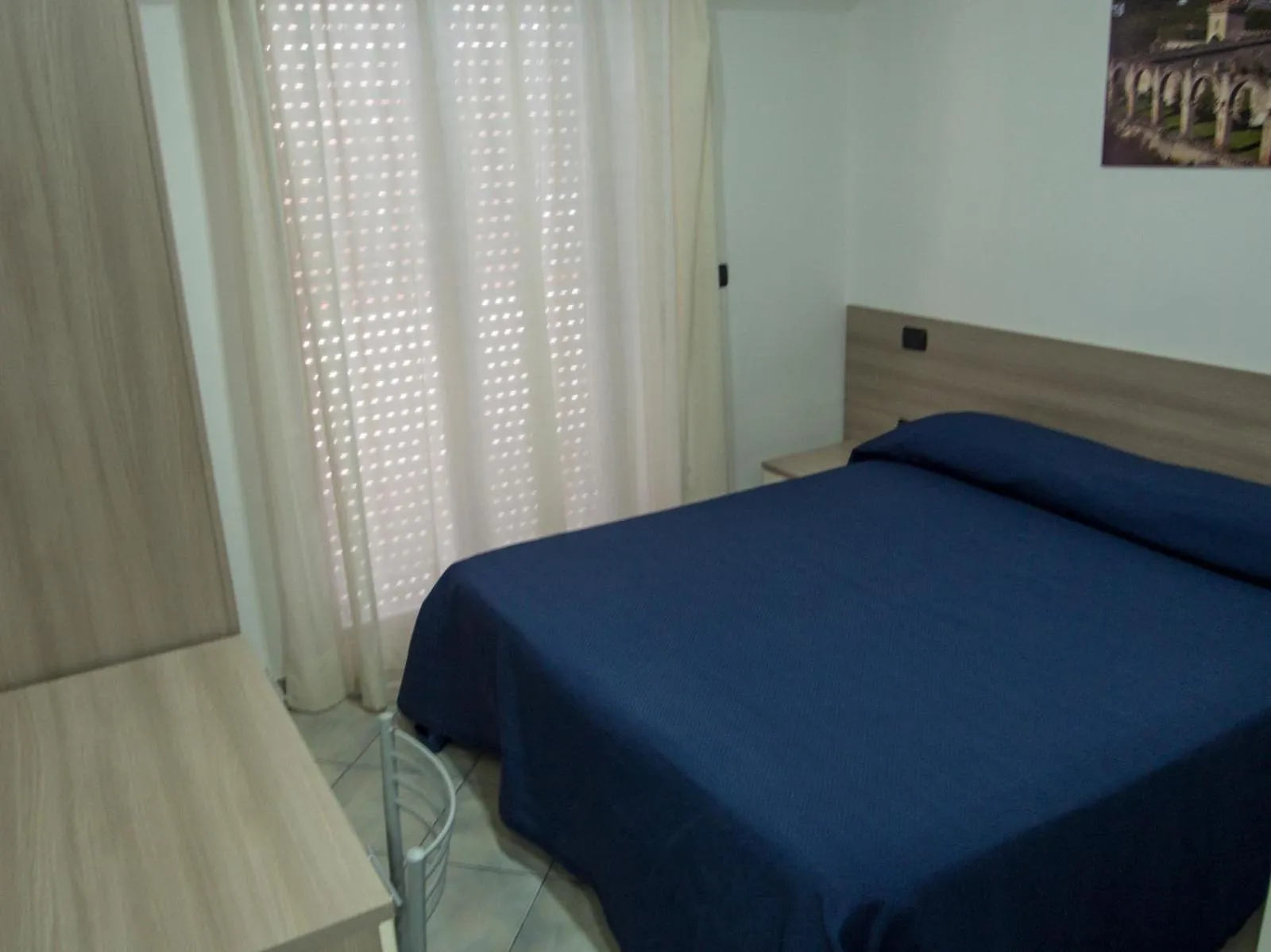 Bed in Hotel Poseidon