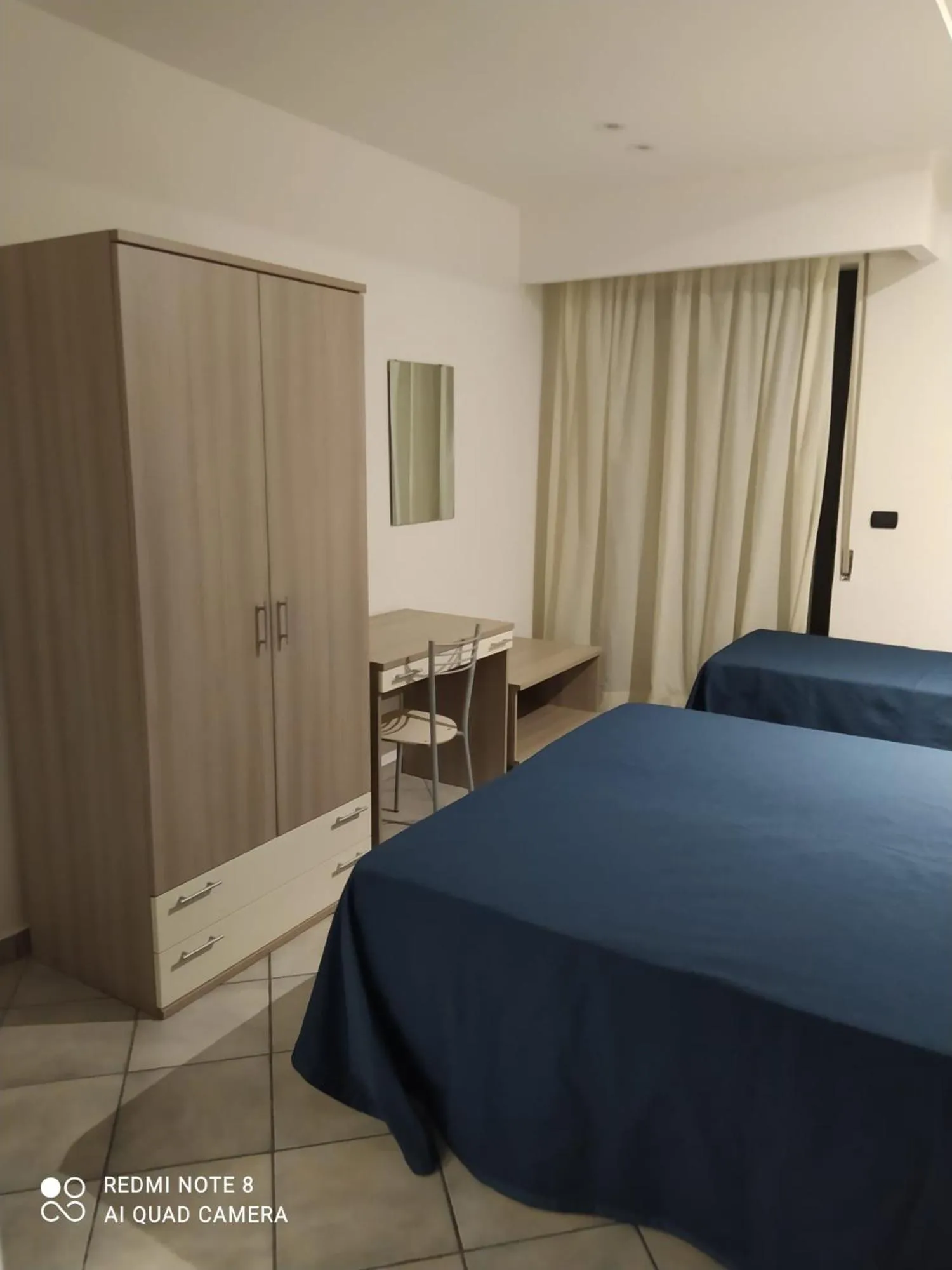 Bed in Hotel Poseidon