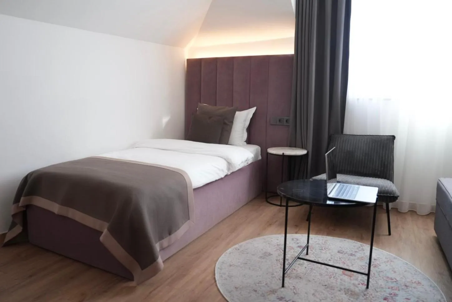 Bed in Bayer's City Hotel