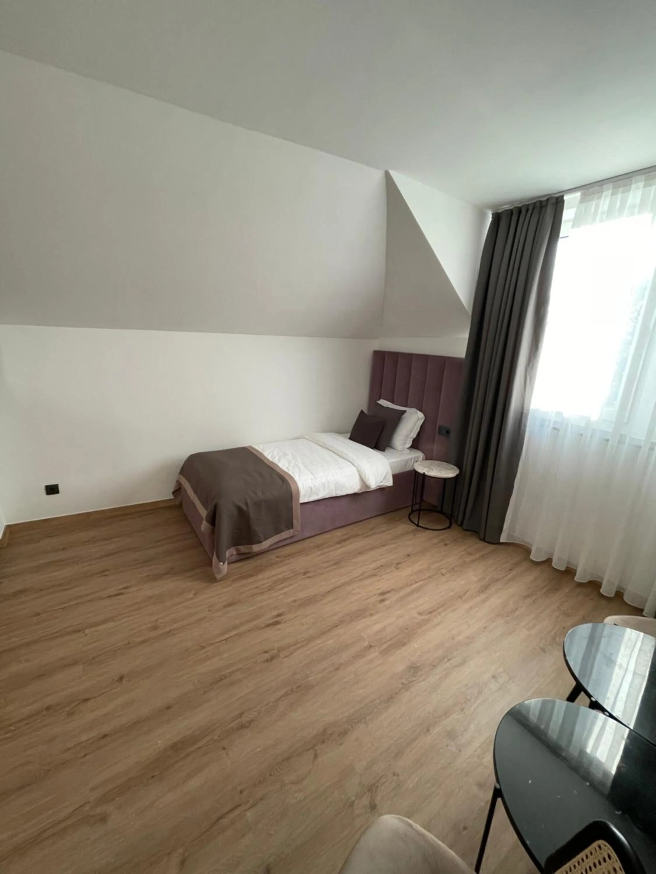 Bed in Bayer's City Hotel