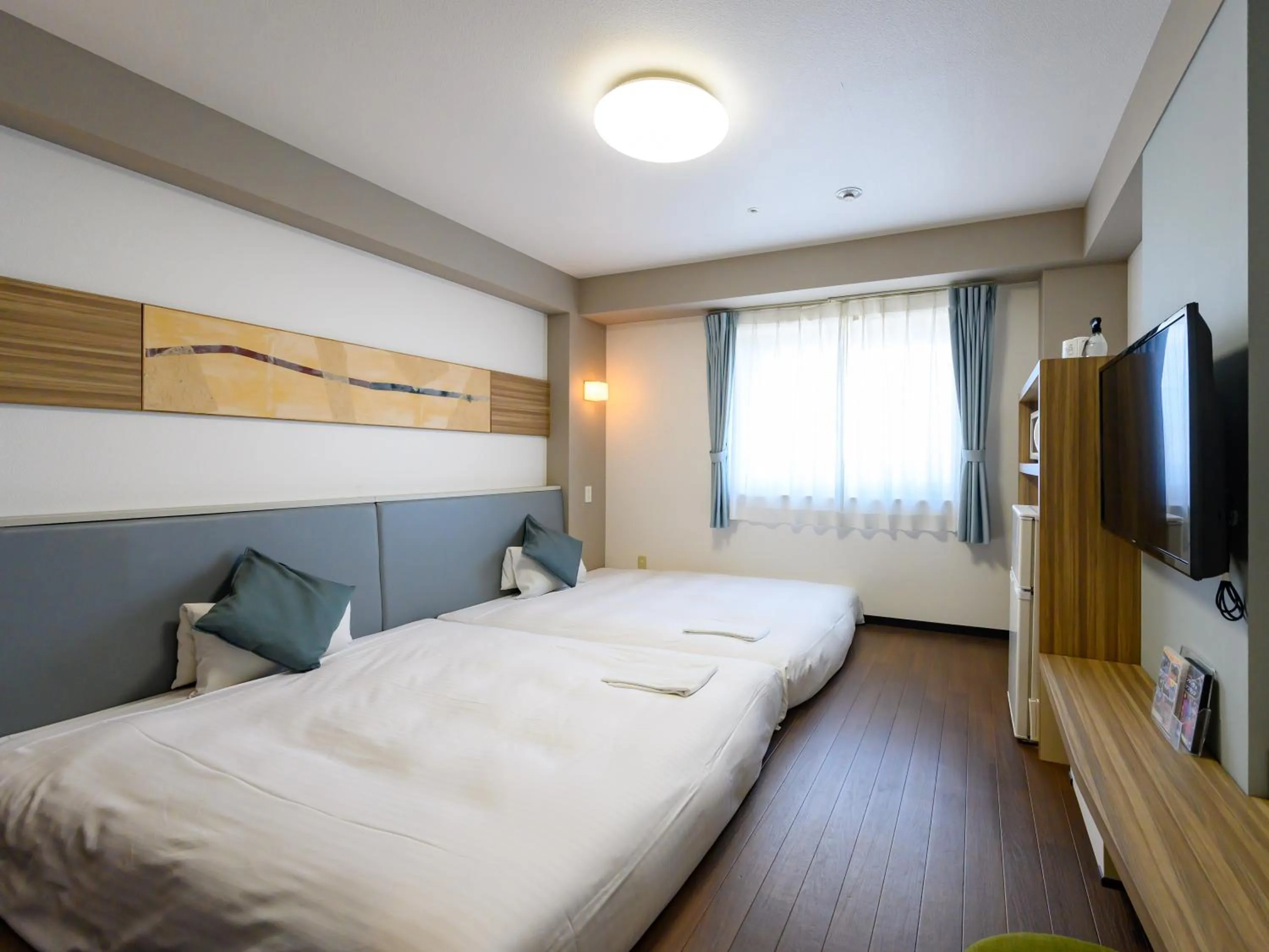 Photo of the whole room, Bed in Hotel Green Park Tsu