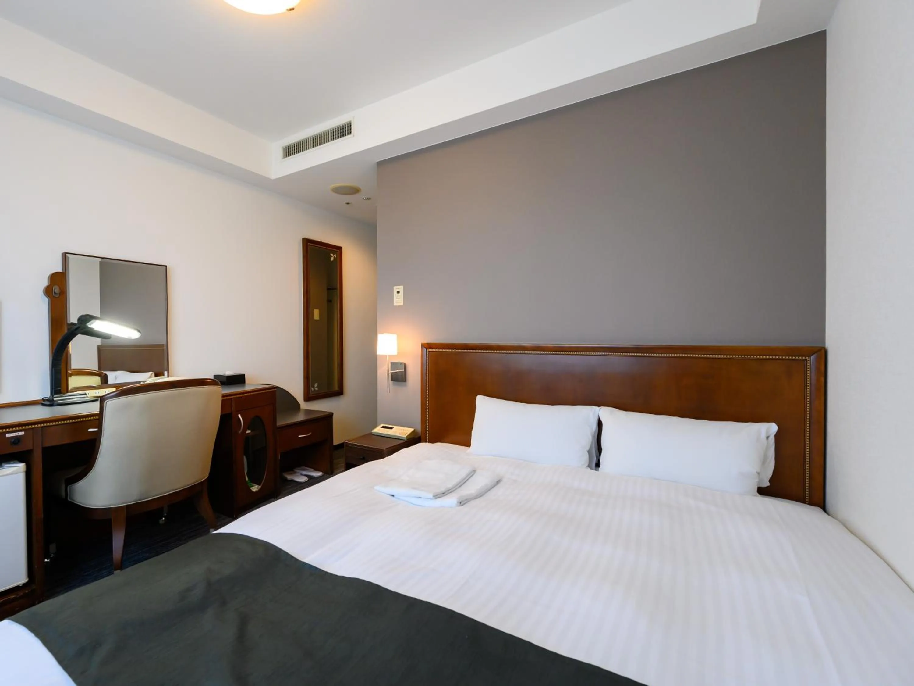 Bed in Hotel Green Park Tsu