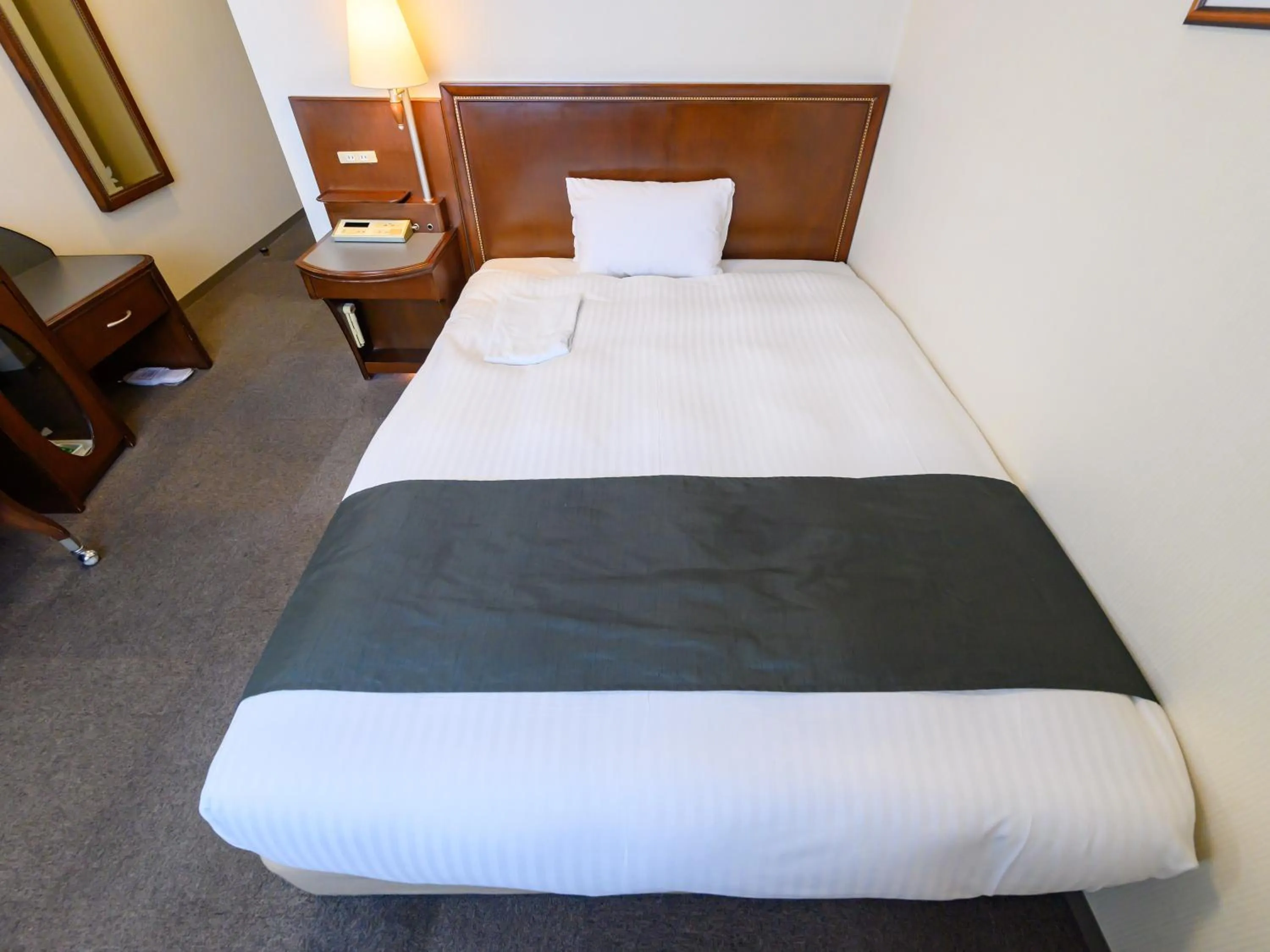 Bed in Hotel Green Park Tsu