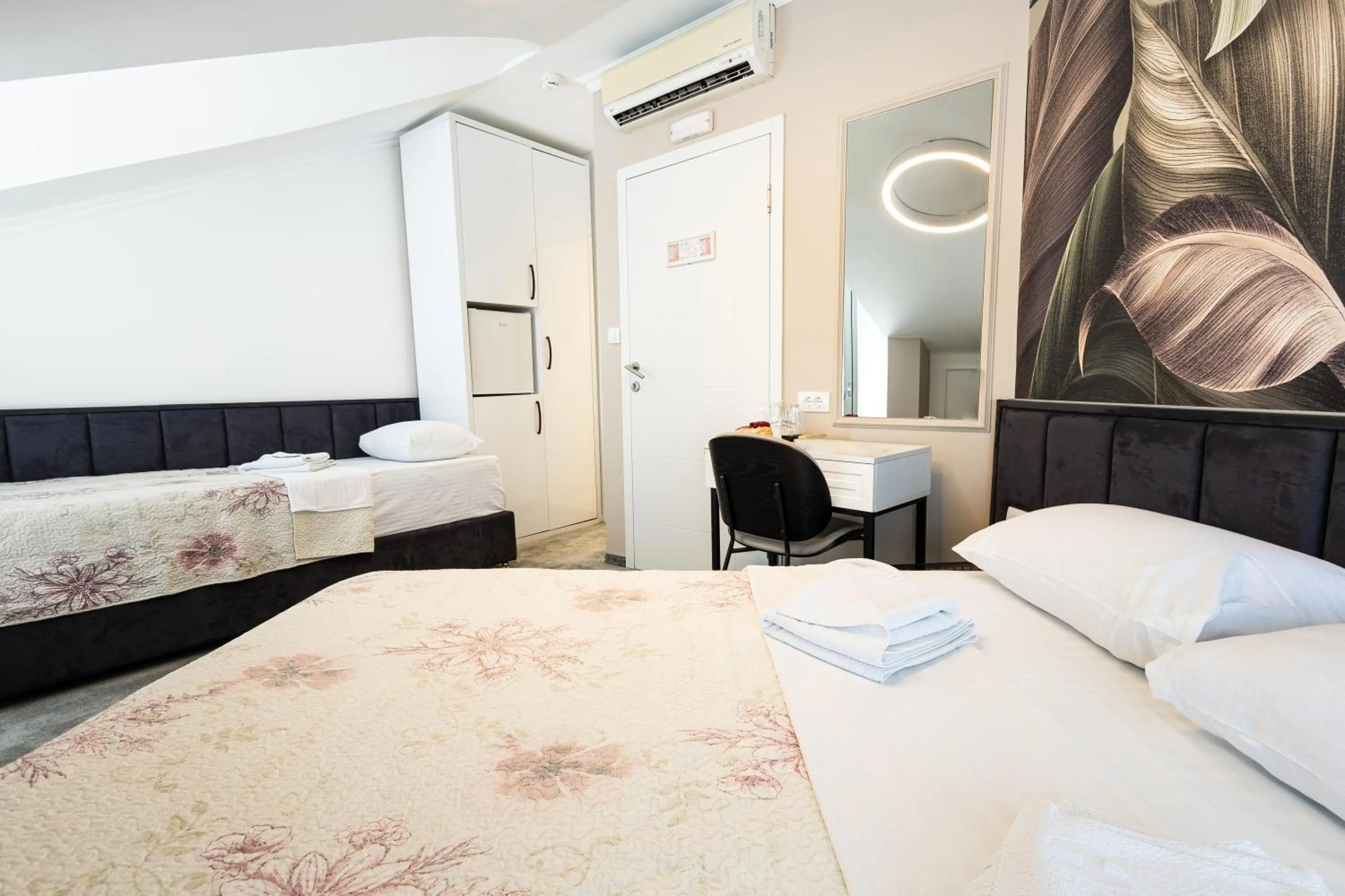 Photo of the whole room, Bed in Garni Hotel Lotos