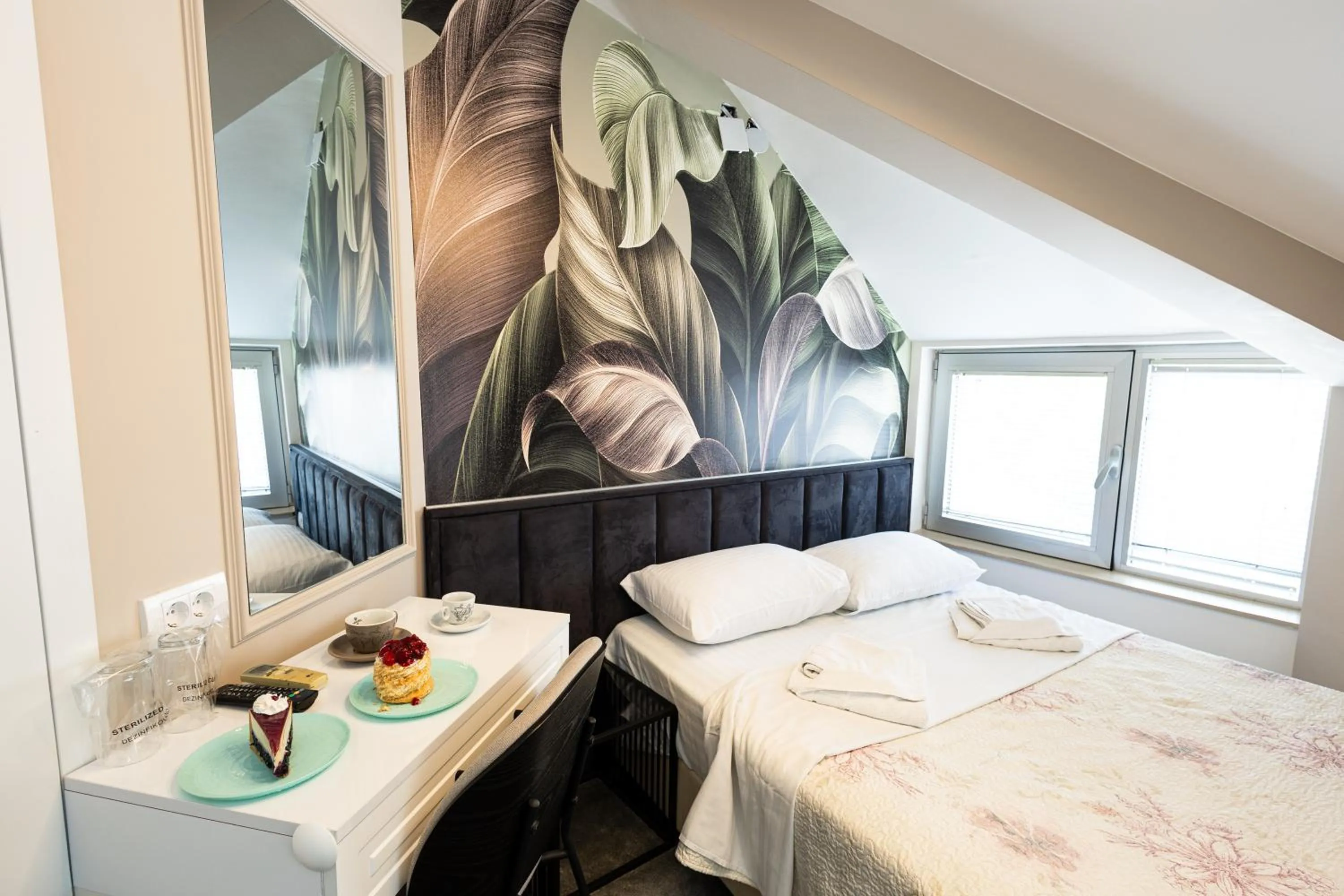 Bed in Garni Hotel Lotos