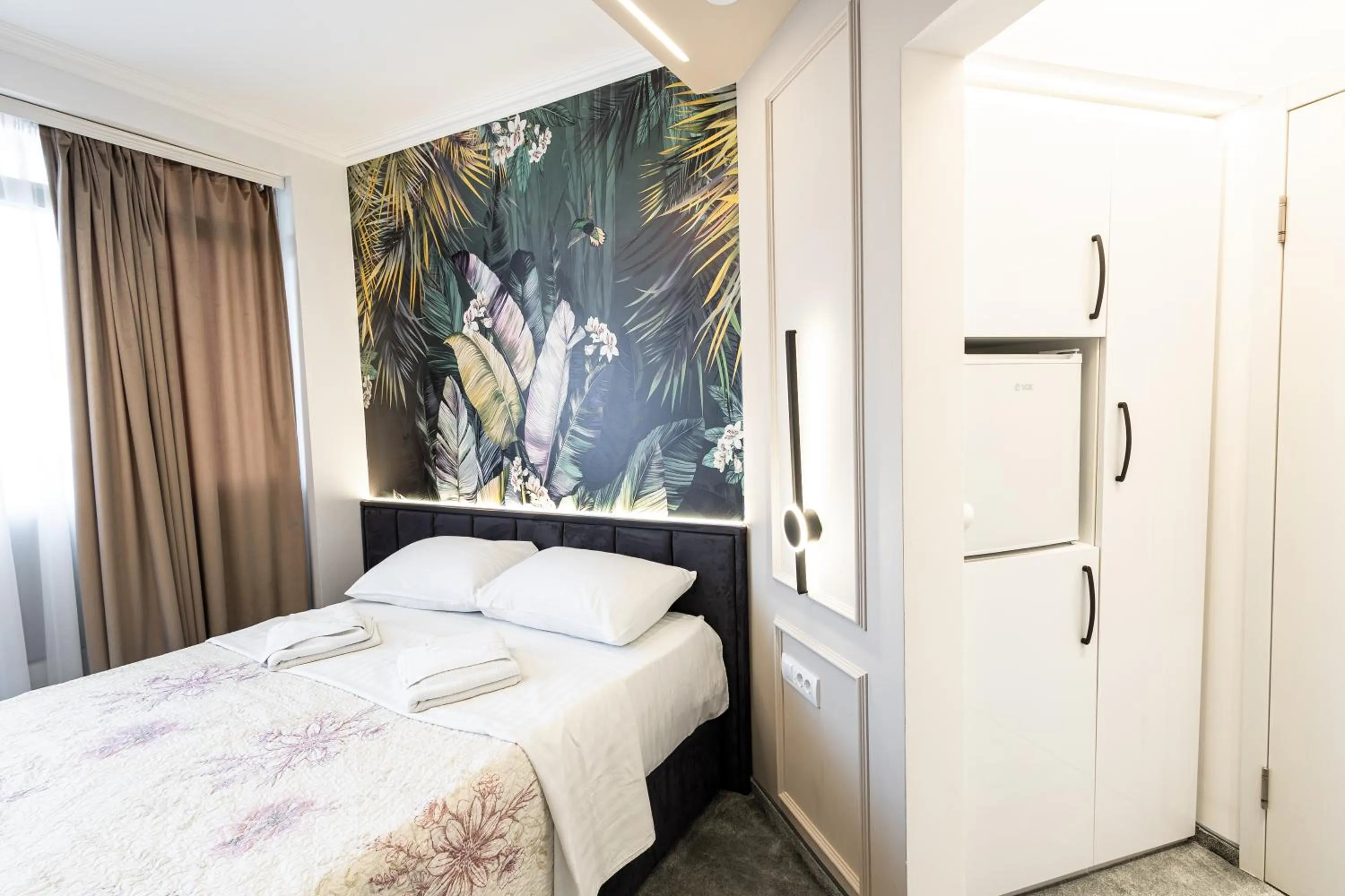 Bed in Garni Hotel Lotos